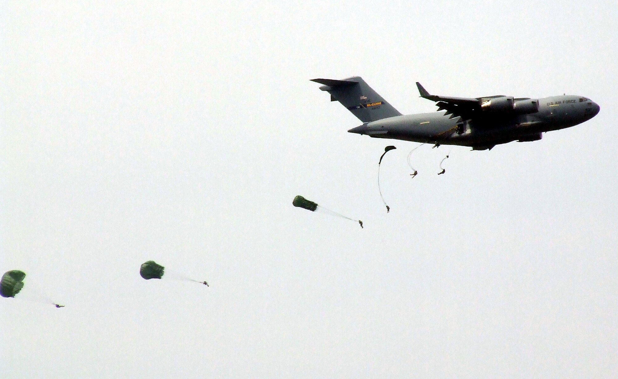 Paratroopers from the U.S. Army's 82nd Airborne Division jump from a McGuire Air Force Base, N.J., C-17 Globemaster III during an event for McGuire Air Expo 2008 May 31.  The expo drew more than 170,000 visitors over two days and it was the culminating event for Air Force Week in Philadelphia.  (U.S. Air Force Photo/Tech. Sgt. Scott T. Sturkol)
