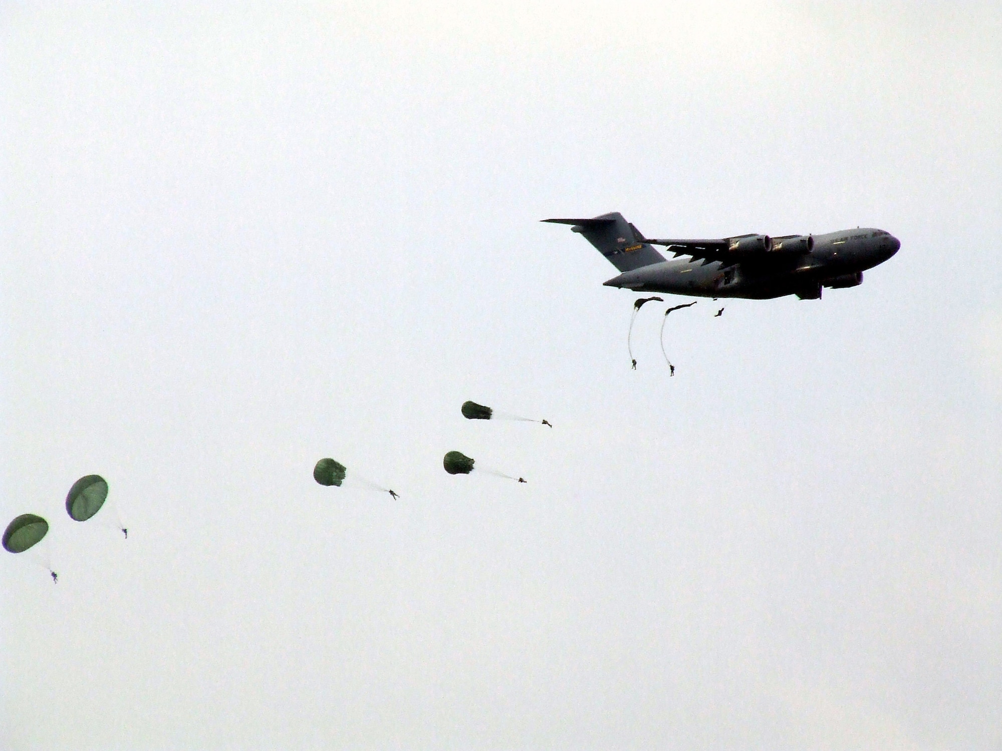 Paratroopers from the U.S. Army's 82nd Airborne Division jump from a McGuire Air Force Base, N.J., C-17 Globemaster III during an event for McGuire Air Expo 2008 May 31.  The expo drew more than 170,000 visitors over two days and it was the culminating event for Air Force Week in Philadelphia.  (U.S. Air Force Photo/Tech. Sgt. Scott T. Sturkol)