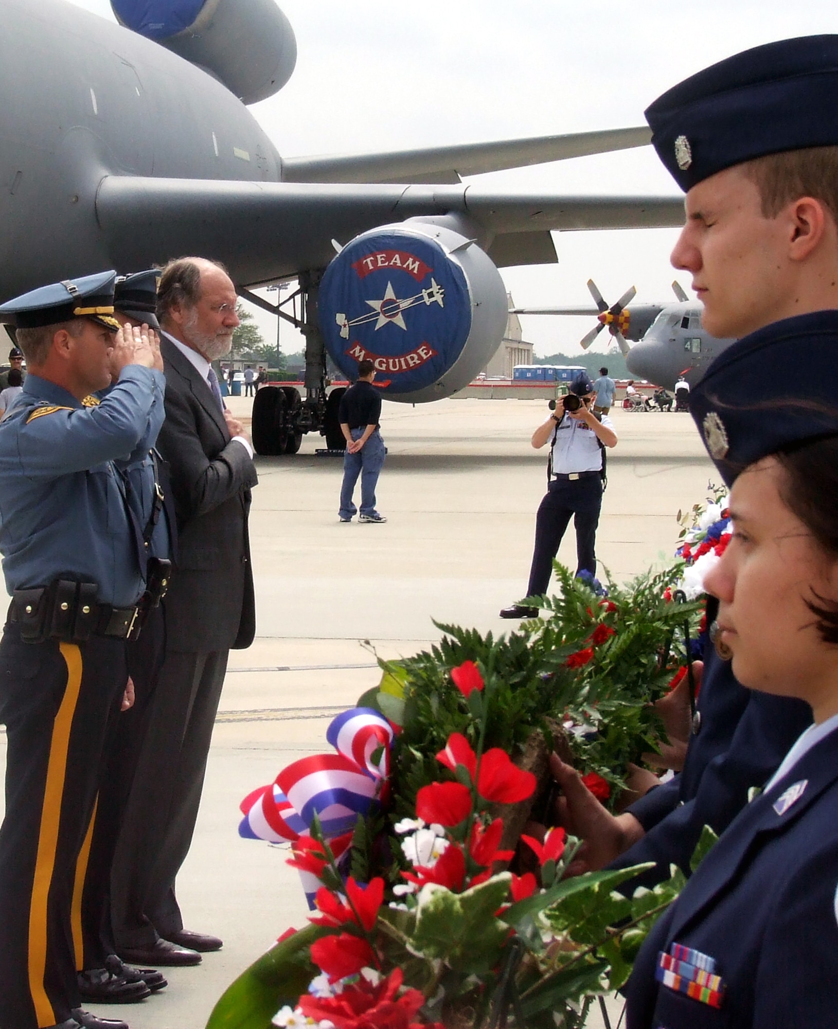 New Jersey state policemen and New Jersey Governor Jon Corzine participate in a wreath-laying ceremony for the McGuire Air Force Base, N.J., Air Expo 2008 May 31.  The ceremony and Air Expo 2008 were culminating events for Air Force Week in Philadelphia.  More than 170,000 people attended the Air Expo.  (U.S. Air Force Photo/Tech. Sgt. Scott T. Sturkol)