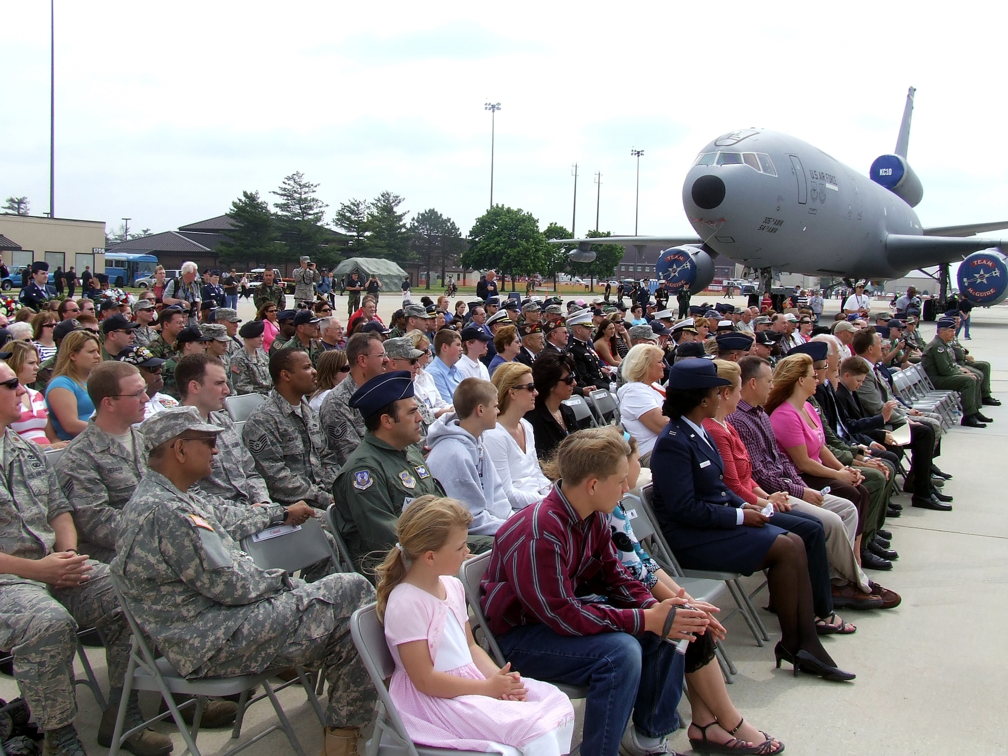 Military members and civilians participate in a wreath-laying ceremony for the McGuire Air Force Base, N.J., Air Expo 2008 May 31.  The ceremony and Air Expo 2008 were culminating events for Air Force Week in Philadelphia.  More than 170,000 people attended the Air Expo.  (U.S. Air Force Photo/Tech. Sgt. Scott T. Sturkol)
