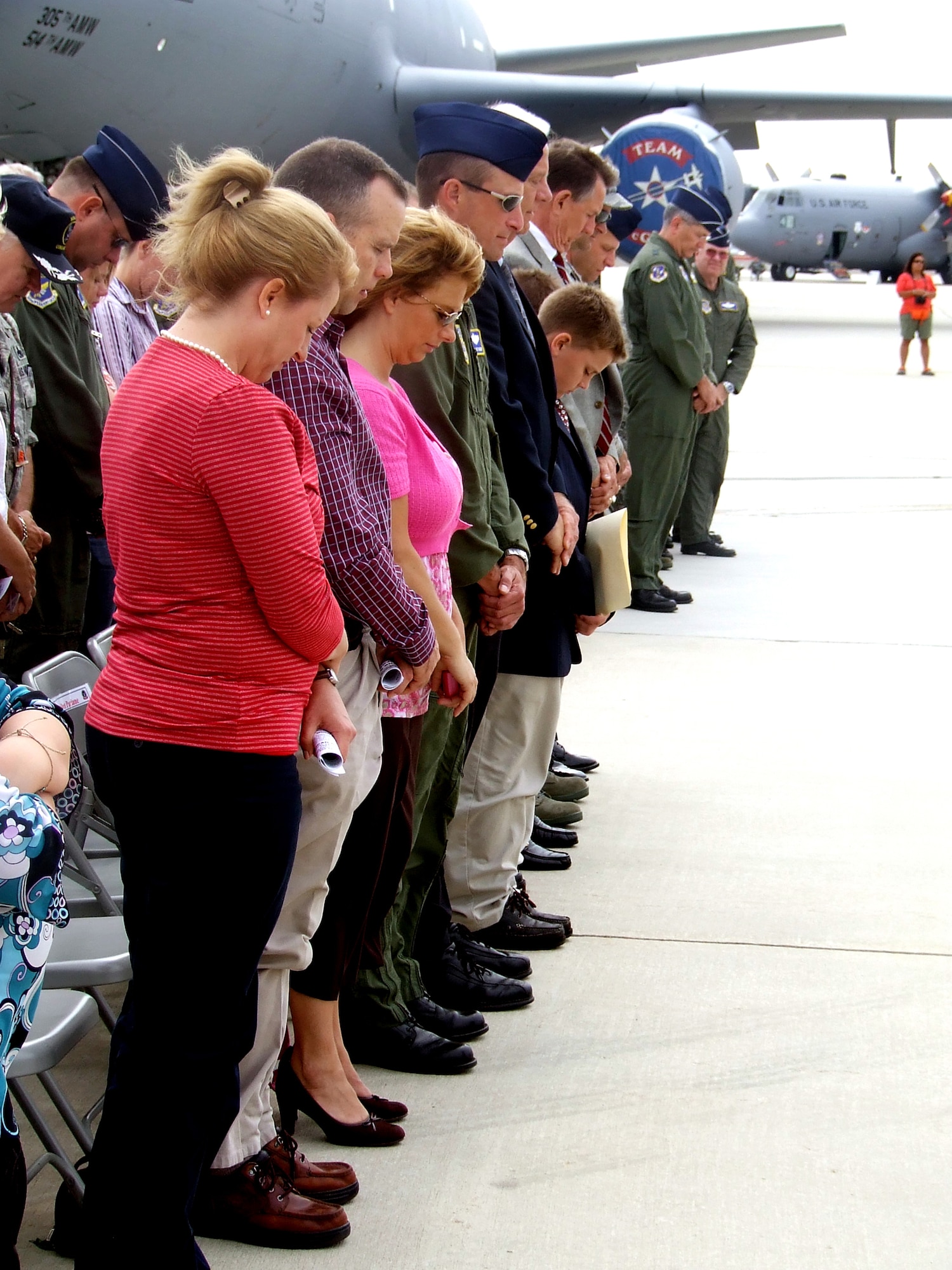 Military members and civilians participate in a wreath-laying ceremony for the McGuire Air Force Base, N.J., Air Expo 2008 May 31.  The ceremony and Air Expo 2008 were culminating events for Air Force Week in Philadelphia.  More than 170,000 people attended the Air Expo.  (U.S. Air Force Photo/Tech. Sgt. Scott T. Sturkol)