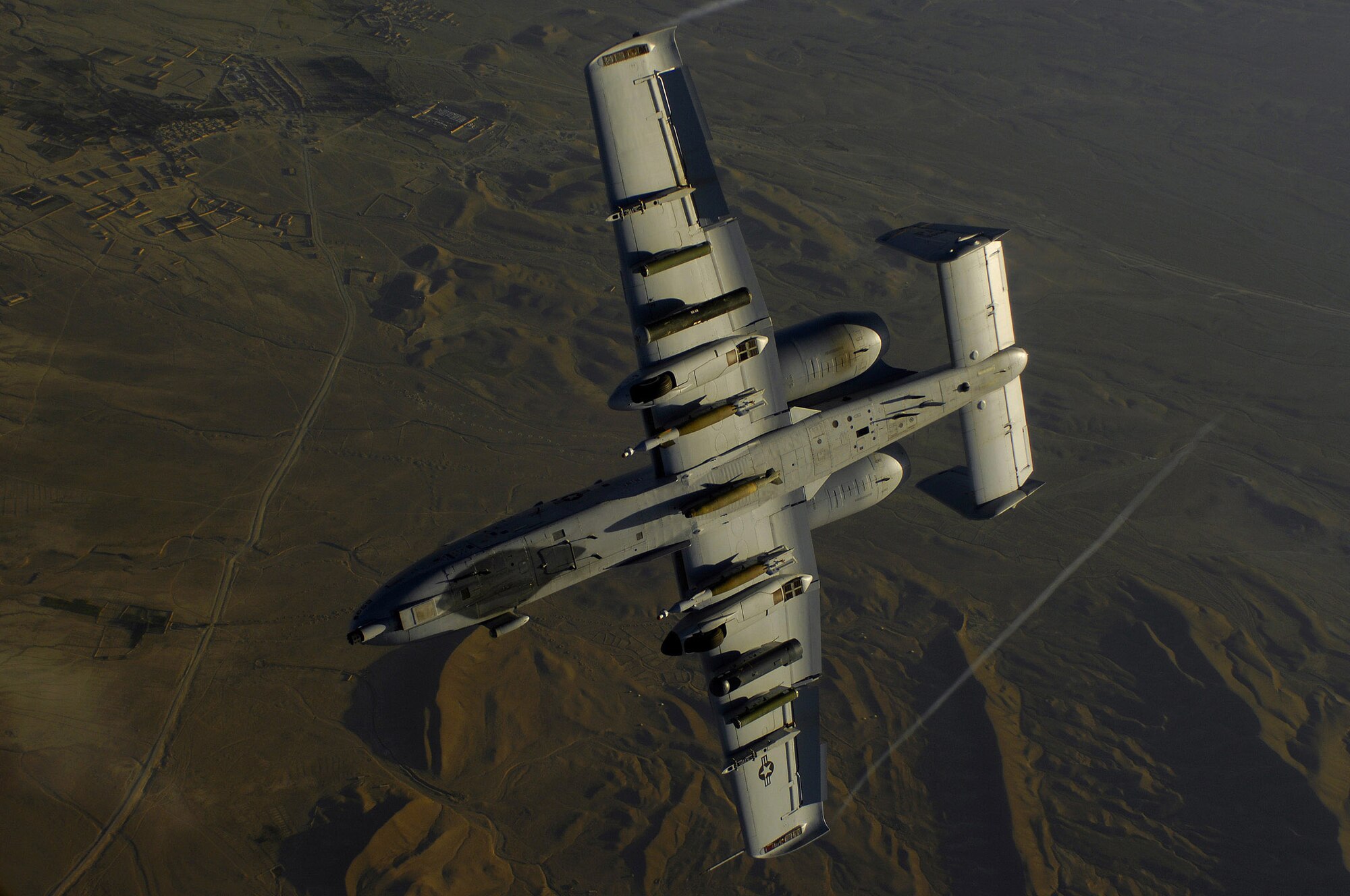 An Air Force A-10 Thunderbolt II returns to the fight after receiving fuel May 29 from a KC-135 Stratotanker during a mission over Afghanistan. The A-10 is deployed in support of Operation Enduring Freedom. (U.S. Air Force photo/Master Sgt. Andy Dunaway)  
