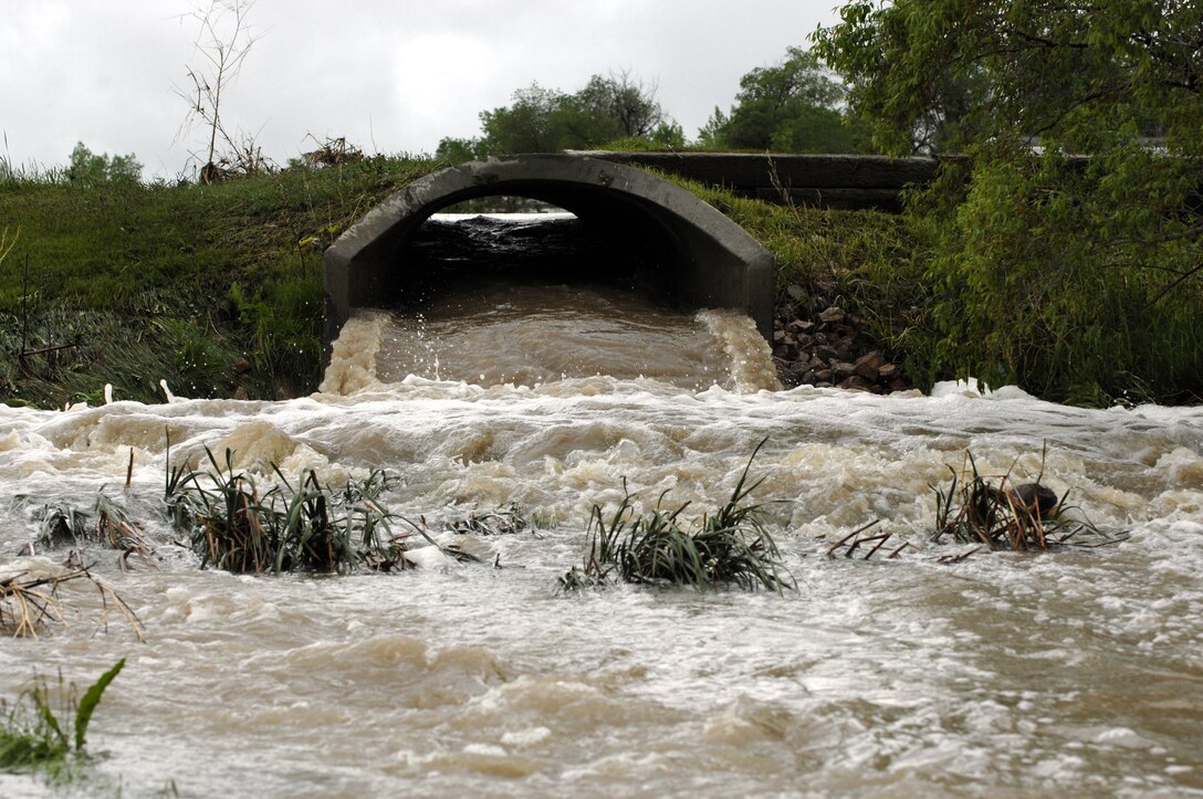 During times of increased rainfall, seemingly harmless, shallow rushing water may be enough to move a vehicle or sweep a pedestrian off their feet. Exercising increased caution is important to ensuring safety. For more information, visit www.ellsworth.af.mil/news/story.asp?id=123101599. (U.S. Air Force photo/Airman Matthew Flynn)