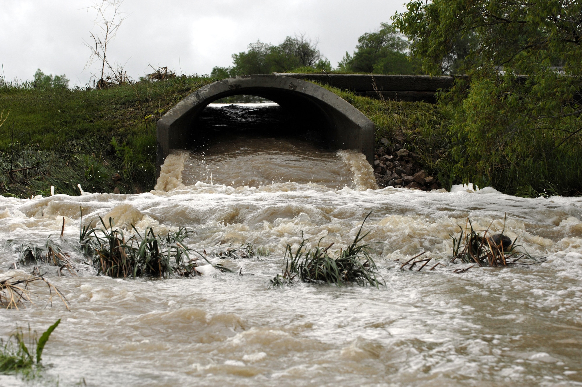 During times of increased rainfall, seemingly harmless, shallow rushing water may be enough to move a vehicle or sweep a pedestrian off their feet. Exercising increased caution is important to ensuring safety. For more information, visit www.ellsworth.af.mil/news/story.asp?id=123101599. (U.S. Air Force photo/Airman Matthew Flynn)