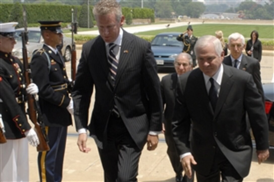 U.S. Defense Secretary Robert M. Gates, right, escorts Belgian Minister of Defense Pieter de Crem through an honor cordon into the Pentagon, June 6, 2008, to talk about bilateral defense issues.  