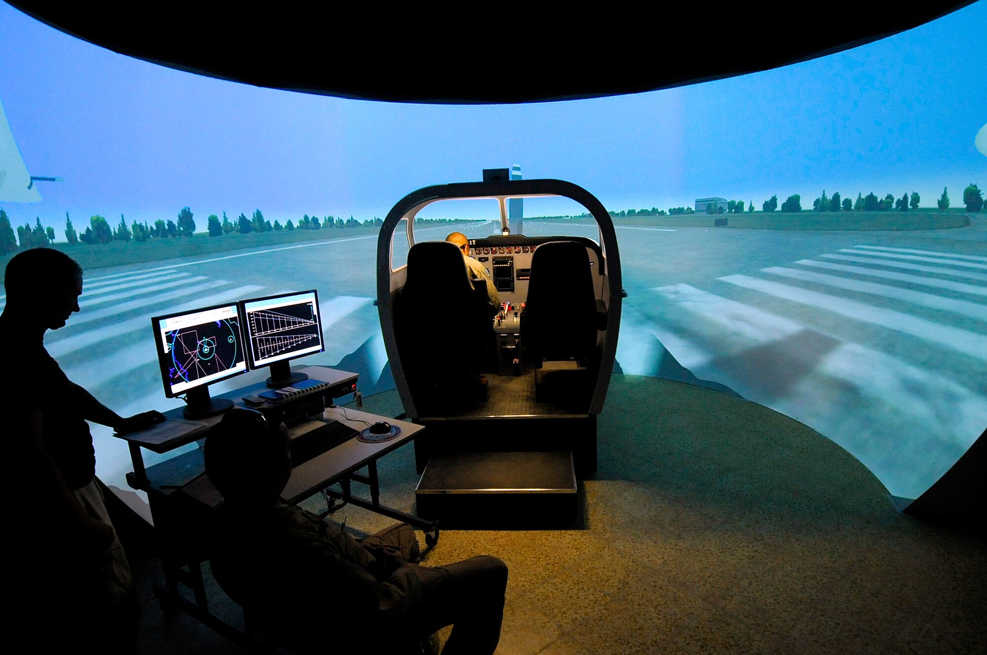 An Iraqi Flight Instructor School student takes the helm in a Cessna simulator recently here. The Iraqi Air Force has continued rebuilding efforts to become a credible and capable military entity by recently establishing the Flight Instructor School (FIS) for Iraqi pilots. The school puts the most experienced of Iraq’s operational pilots into the classroom and cockpit at the Iraqi Flying Training Wing here in an effort to teach the fundamentals of flight instruction. (U.S. Air Force photo by Tech. Sgt. Jeffrey Allen)
