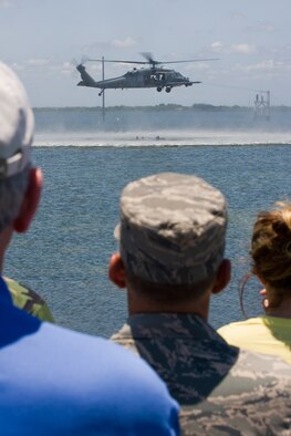 PATRICK AFB, Fla. --  Air Force Reservists from the 920th Rescue Wing here showcased their heroes and hardware for civilian employers of Air Force Reservists and Reservists’ family members during their June training weekend.  Every year the 920th RW invites employers and family members to the wing to get a glimpse of the mission.  The 920th RW is the only Air Force Reserve Wing that performs combat search and rescue which keeps its Airmen busier than an average Air Force Reserve Wing.  The Wing is comprised of 1,200 Airmen and flies both fixed and rotor wing aircraft.  It maintains 6 HC-130P/N extended-range Hercules aircraft and 9 HH-60G Pave Hawk helicopters. (U.S. Air Force photo / Tech. Sgt. Jeremy Allen)