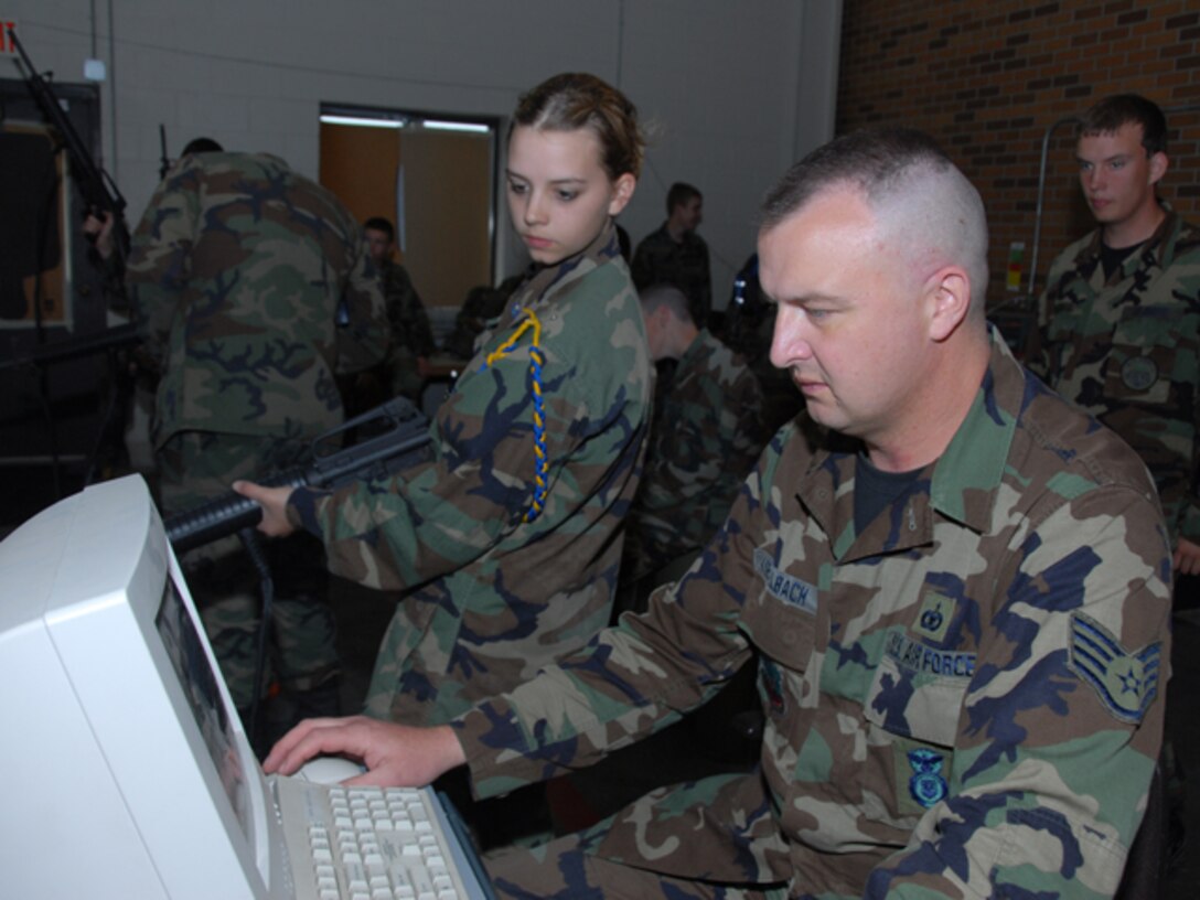 Junior ROTC Cadets fire the FATS machine at the N.D. Air National Guard during a base tour designed to teach students about the Air National Guard on June 5th.