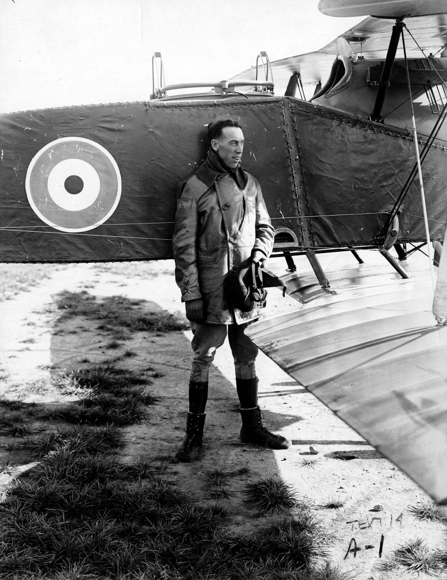 Capt. Rudolph Schroeder stands by the fuselage of a Bristol fighter, the type in which he set a world altitude record in 1918. (U.S. Air Force photo)