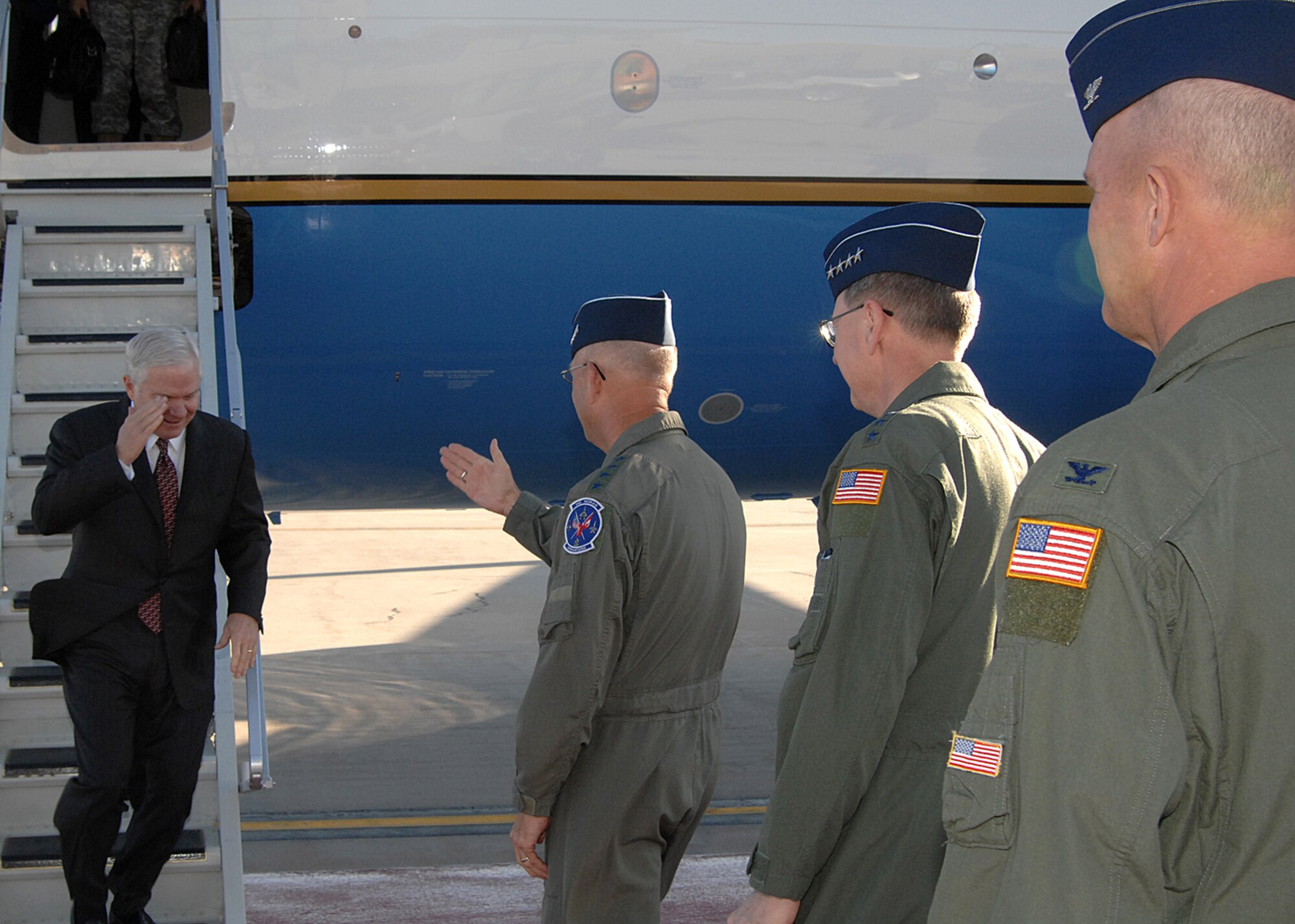 PETERSON AIR FORCE BASE, Colo. -- Secretary of Defense Robert Gates arrives at the base flight line here June 9.  Secretary Gates is visiting Peterson AFB to deliver a speech reinforcing his message that the Air Force must apply more rigor to its responsibilities with nuclear weapons on the heels of the resignation of the Air Force’s top two leaders.  Gen. C.  Robert Kehler, Air Force Space Command commander, Gen. Gene Renuart, NORAD – U.S. Northern Command commander, and Col. Jay Raymond, 21st Space Wing commander, greeted Secretary Gates upon his arrival. (U.S. Air Force Photo by Duncan Wood)