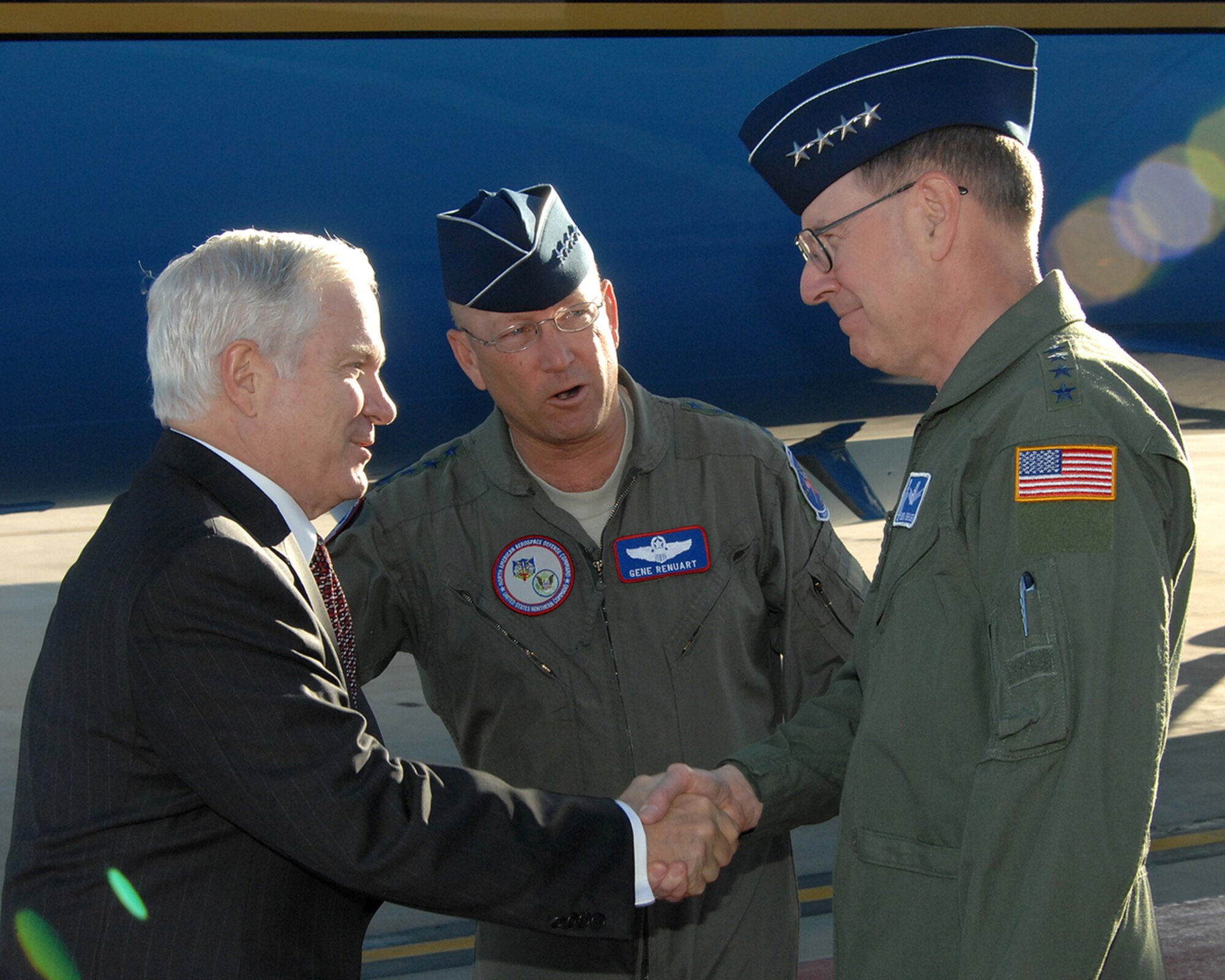 PETERSON AIR FORCE BASE, Colo. -- Secretary of Defense Robert Gates greets Gen. C.  Robert Kehler, Air Force Space Command commander, Gen. Gene Renuart, NORAD – U.S. Northern Command commander, upon his arrival at the base flight line here June 9.  Secretary Gates is visiting Peterson AFB to speak to Airmen and answer their questions following the resignation of the Air Force’s top two leaders.  (U.S. Air Force Photo by Duncan Wood)