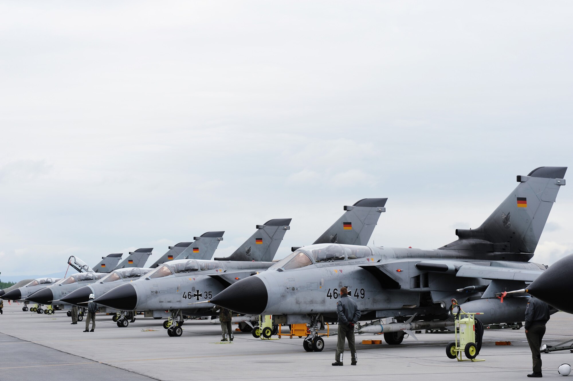Several German Panavia Tornados sit on the tarmac waiting to taxi and take off for a training mission June 9, 2008, at Eielson Air Force Base, Alaska during RF-A 08-3. RED FLAG-Alaska, a series of Pacific Air Forces commander-directed field training exercises for U.S. forces, provides joint offensive counter-air, interdiction, close air support, and large force employment training in a simulated combat environment. (U.S. Air Force Photo/Airman 1st Class Jonathan Snyder)