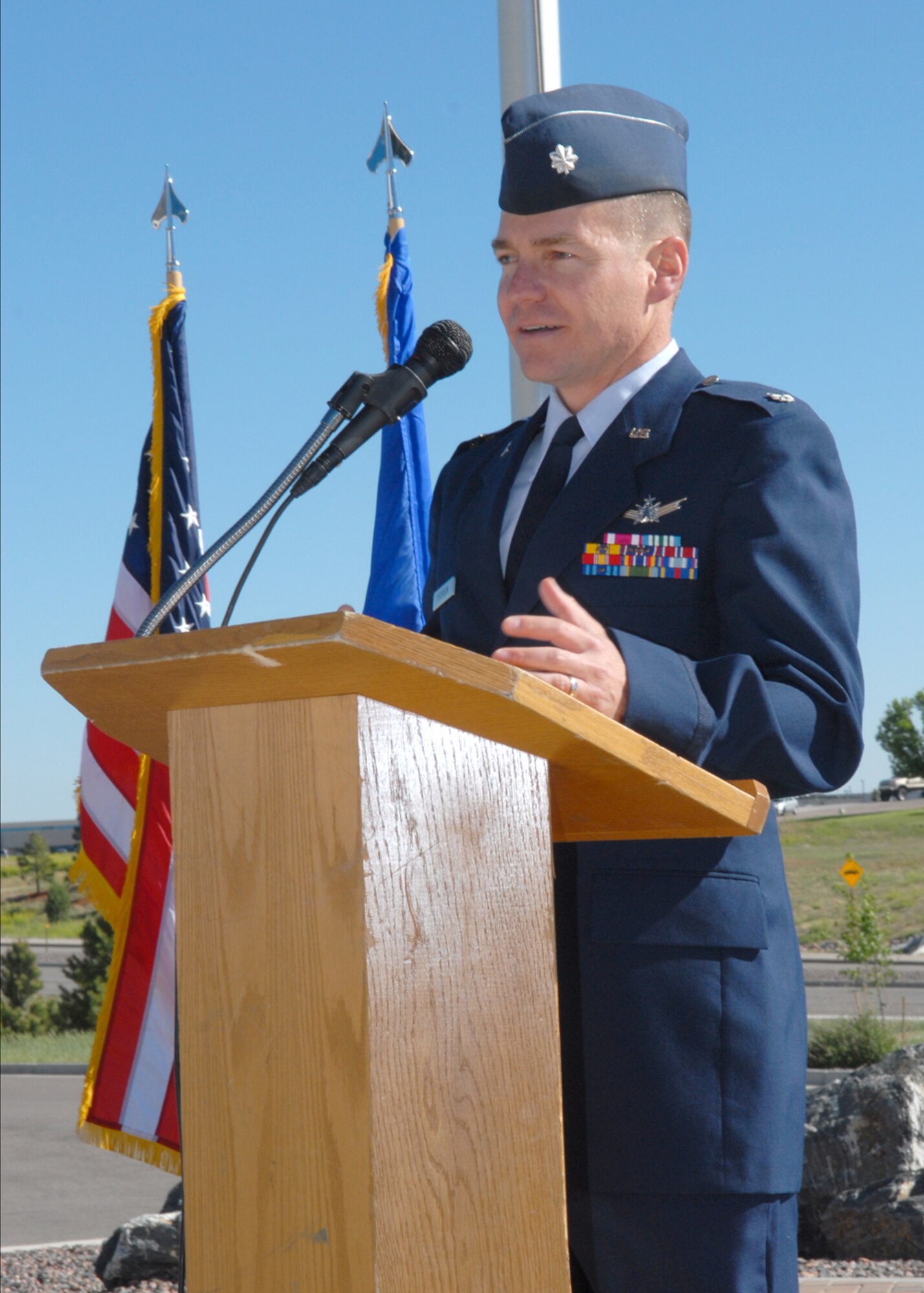 BUCKLEY AIR FORCE BASE, Colo. -- Lt. Col. Robert Peterson speaks to his new squadron durring a change of command ceremony here, June 7, where he assumed command of the 8th Space Warning Squadron. (U.S. Air Force photo by Staff Sgt. Dallas Edwards)