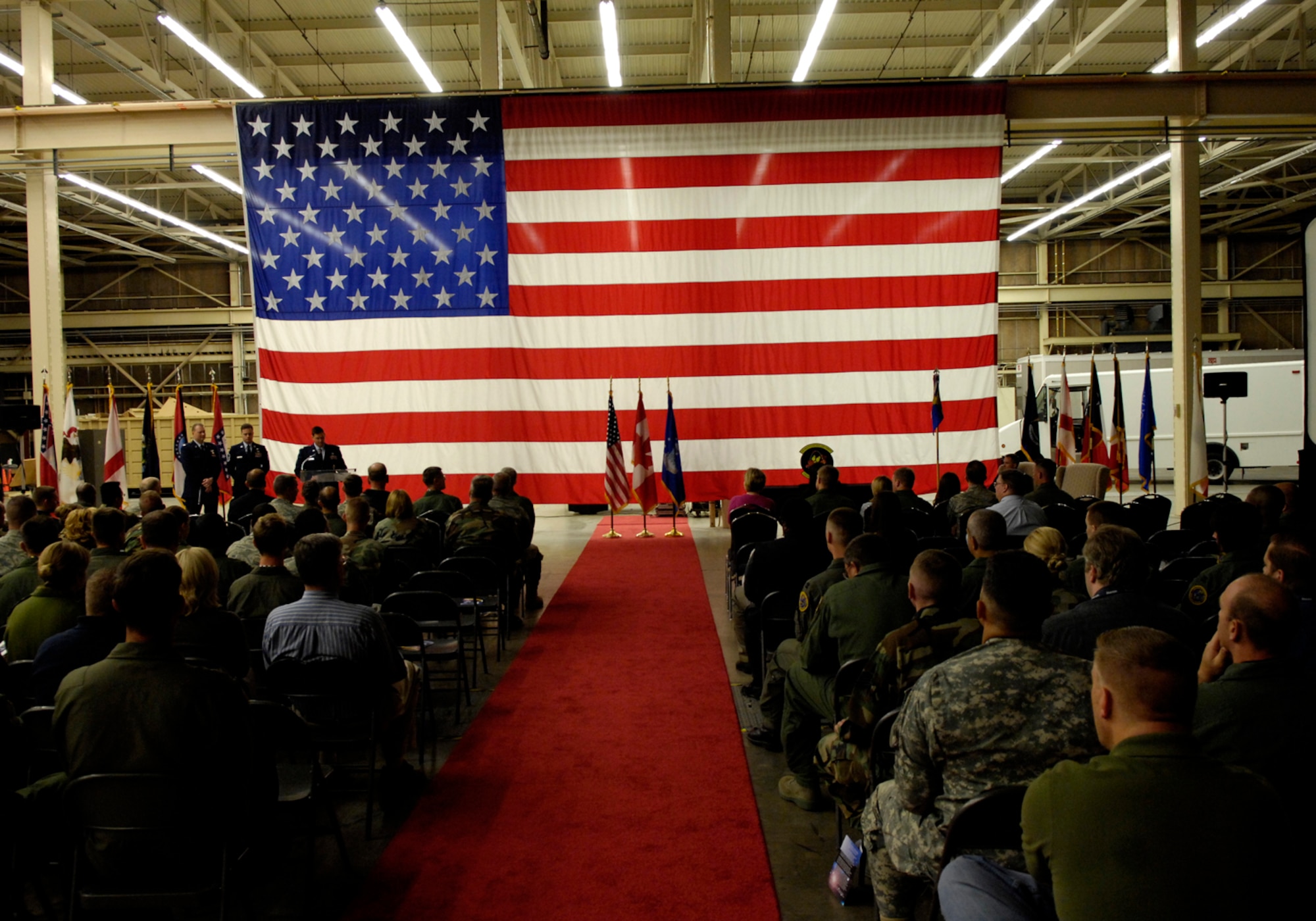VANDENBERG AIR FORCE BASE, Calif. -- Lt. Col. Chance Saltzman, 1st Space Control Squadron commander, speaks during the 1st SPCS Inactivation Ceremony at Joint Space Operations Center high bay, June 9, 2008.  The 1st SPCS deactivated after more than 45 years of service, and several name changes, tracking objects from their placement in space to their final orbit and re-entry back to earth. (U.S. Air Force photo/Airman 1st Class Jonathan Olds)
