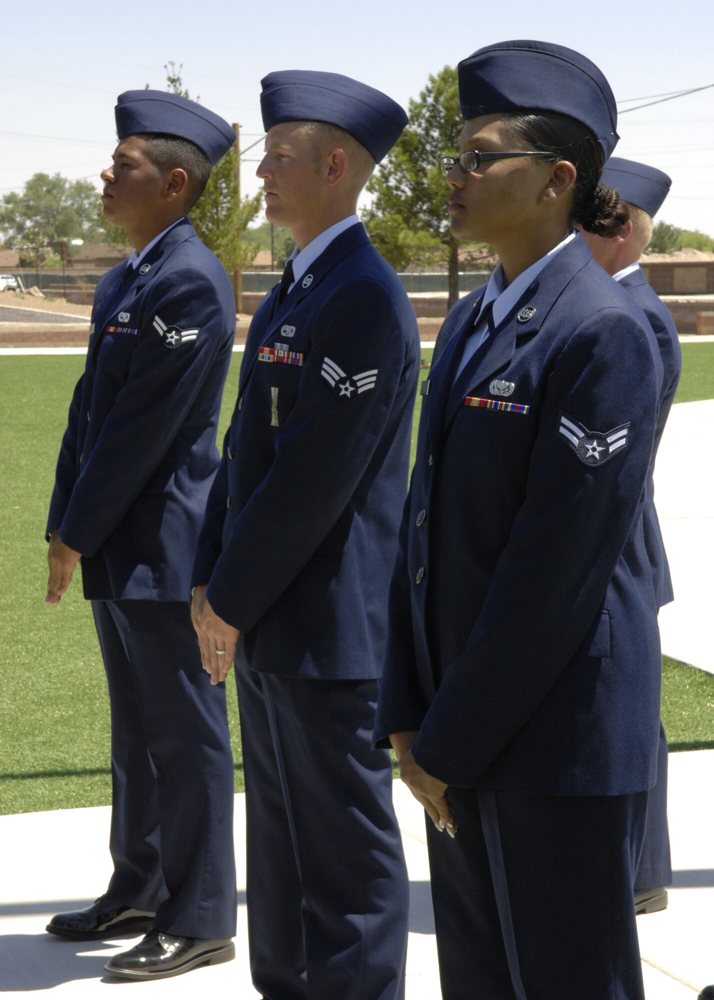The newest members of the Steel Talons Honor Guard prepare to receive their graduation coins during their graduation ceremony, June 3 at Heritage Park on Holloman Air Force Base,N.M. This is the third Honor Guard class to graduate this year. (U.S. Air Force photo/Airman 1st Class Rachel A. Kocin)