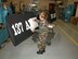 Staff Sgt. Sue Hathaway, a structural repair and corrosion control technician with the Air Force Reserve's 507th Air Refueling Wing, peels away transfer paper backing while applying new lettering to a KC-135 ruddervator. As a result of the 2005 Base Realignment and Closure commission, 507th ARW became the first Air Force Reserve wing to host an Air National Guard wing. The Oklahoma Air National Guard's 137th ARW began flying air reserve associate missions at Tinker Air Force Base, Okla., earlier this year. Assigning wing identification on the KC-135 ruddervator is part of local processes to provide identification and partnership parity. (U.S. Air Force photo/Lt. Col. Rich Curry) 
