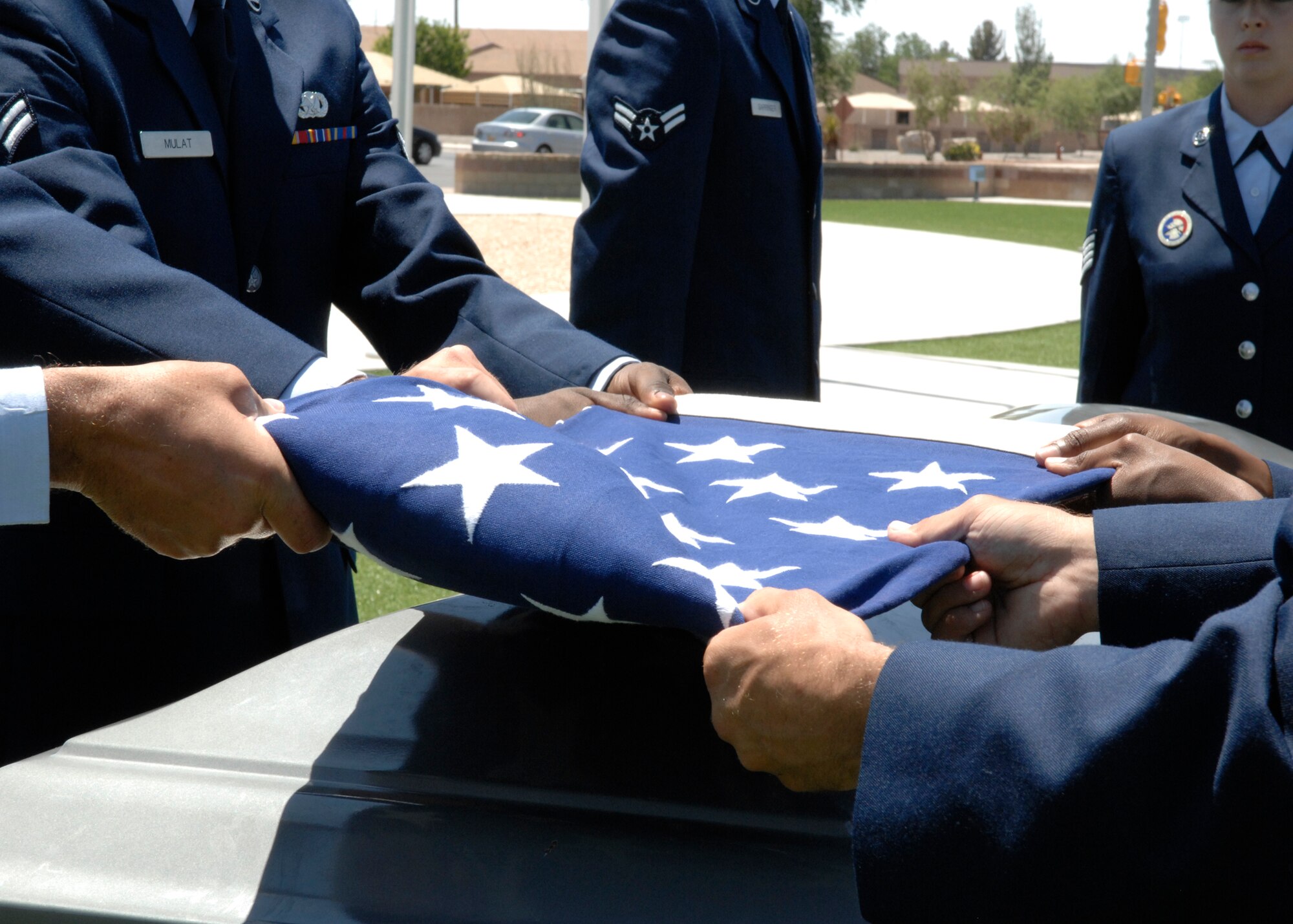 The newest members of the Steel Talons Honor Guard demonstrate what an actual funeral would be like during their graduation ceremony, June 3 at Heritage Park on Holloman Air Force Base,N.M. The Honor Guard averages 10-15 funerals per month. (U.S. Air Force photo/Airman 1st Class Rachel A. Kocin)