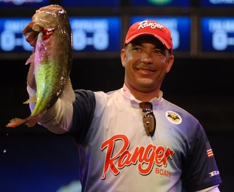 Master Sgt. Greg Auzenne, 325th Aircraft Maintenance Squadron production supervisor, finished second place in the Wal-Mart Forrest L. Wood Tour, Beaver Lake Event, bass fishing tournament in Arkansas with three bass weighing 7 pounds, six ounces for a prize of $10,000 May 14-16.  (Photo courtesy of Rob Newell and FLWoutdoors.com)