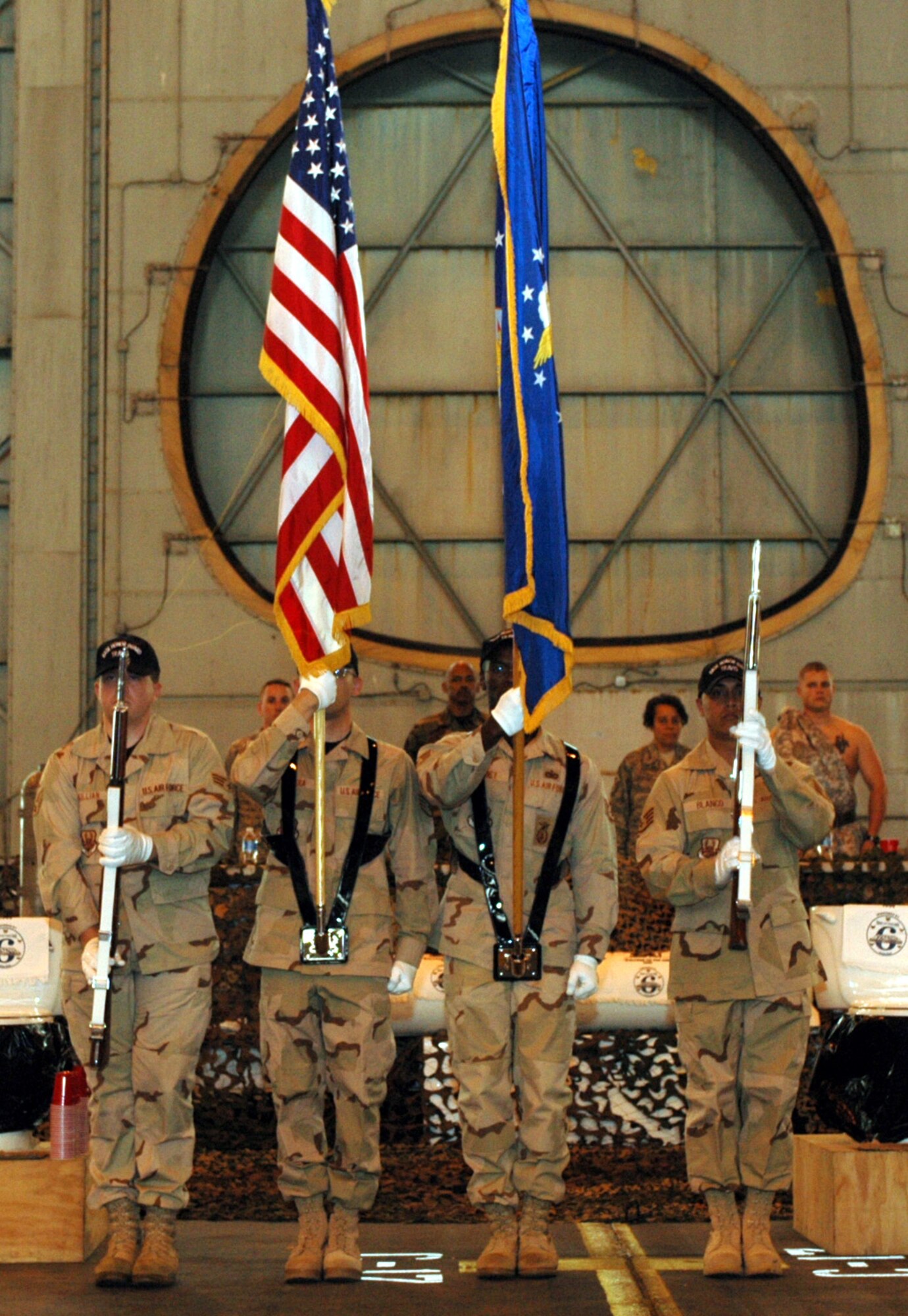 Members of the Travis Honor Guard post the colors prior to the beginning of the Enlisted Combat Dining-in “Welcome to the AOR 2008”, sponsored by the Travis Rising 6. (U.S. Air Force photo/Senior Airman Shaun Emery)