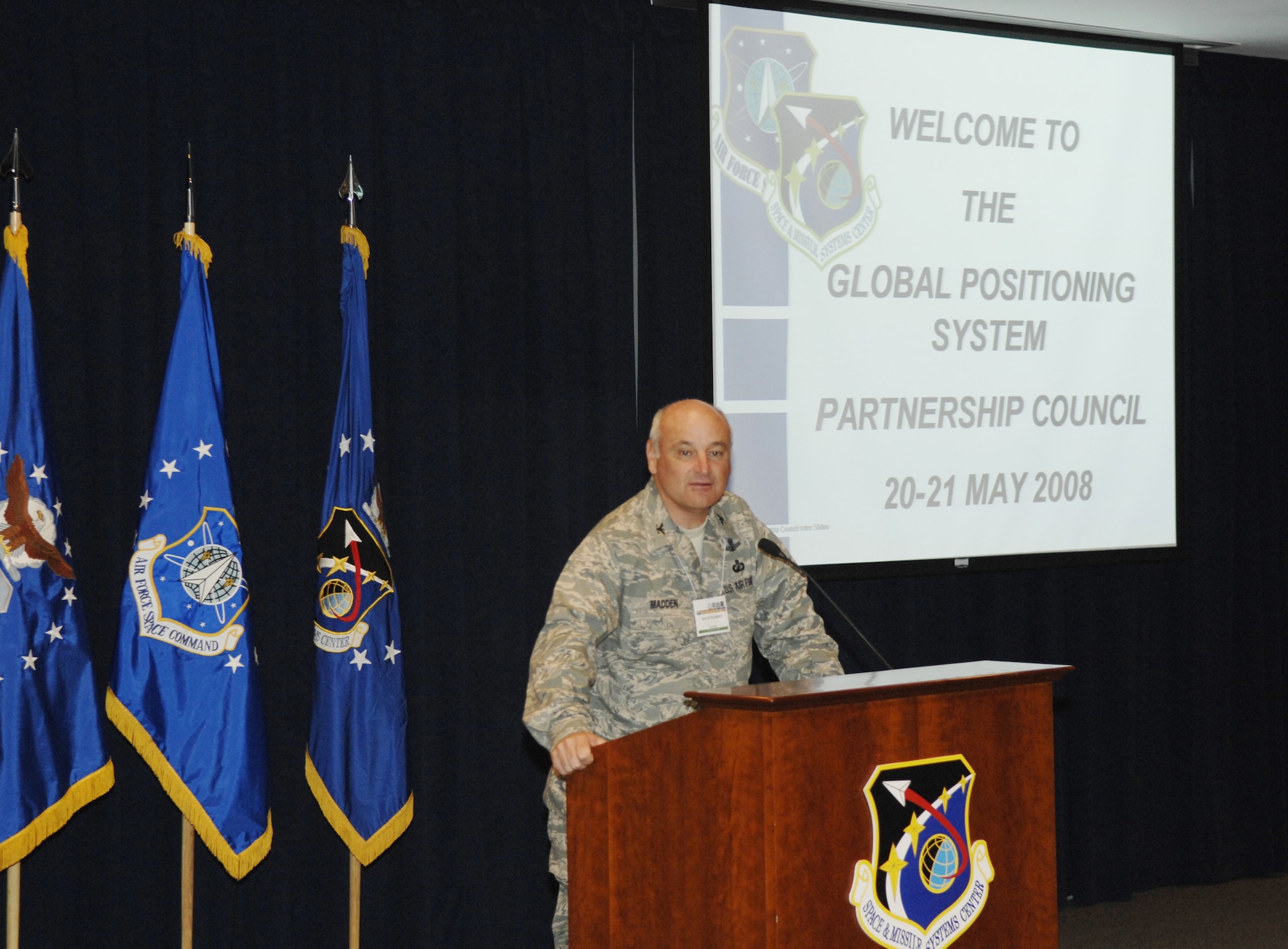 Col. Dave Madden, GPS Wing Commander, speaks to GPS Partnership Council Members. (photo by Joe Juarez)
