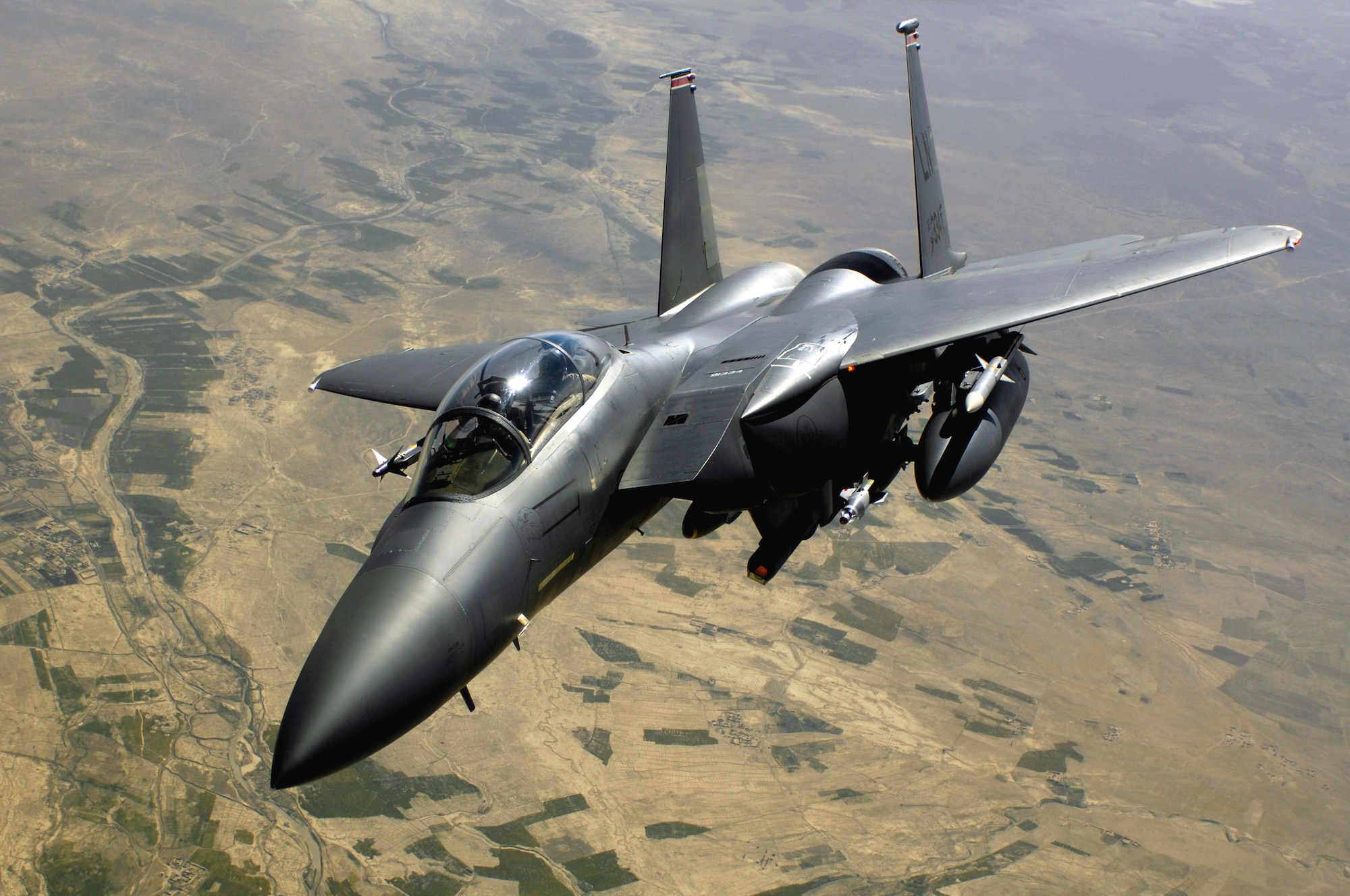 An Air Force F-15E Strike Eagle aircraft returns to the fight after receiving fuel from a KC-135R Stratotanker during a mission over Afghanistan (U.S. Air Force photo/Master Sgt. Andy Dunaway)  

