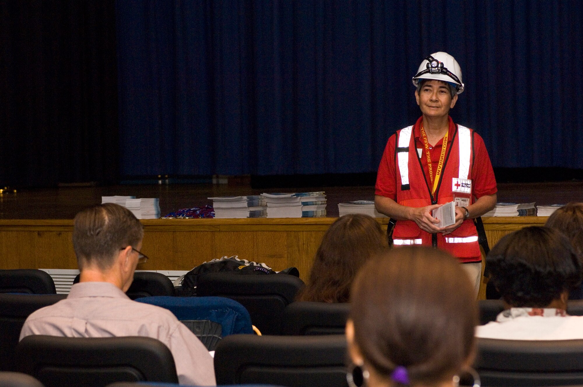 LANGLEY AIR FORCE BASE, Va. -- Carol Franzen, an Armed Forces Emergency Services coordinator for the Red Cross, speaks to Langley personnel at a hurricane preparedness workshop at the base theatre June 6.  The workshop was designed to help people mentally and financially prepare for hurricane evacuation.  (U.S. Air Force photo/Senior Airman Barry Loo)