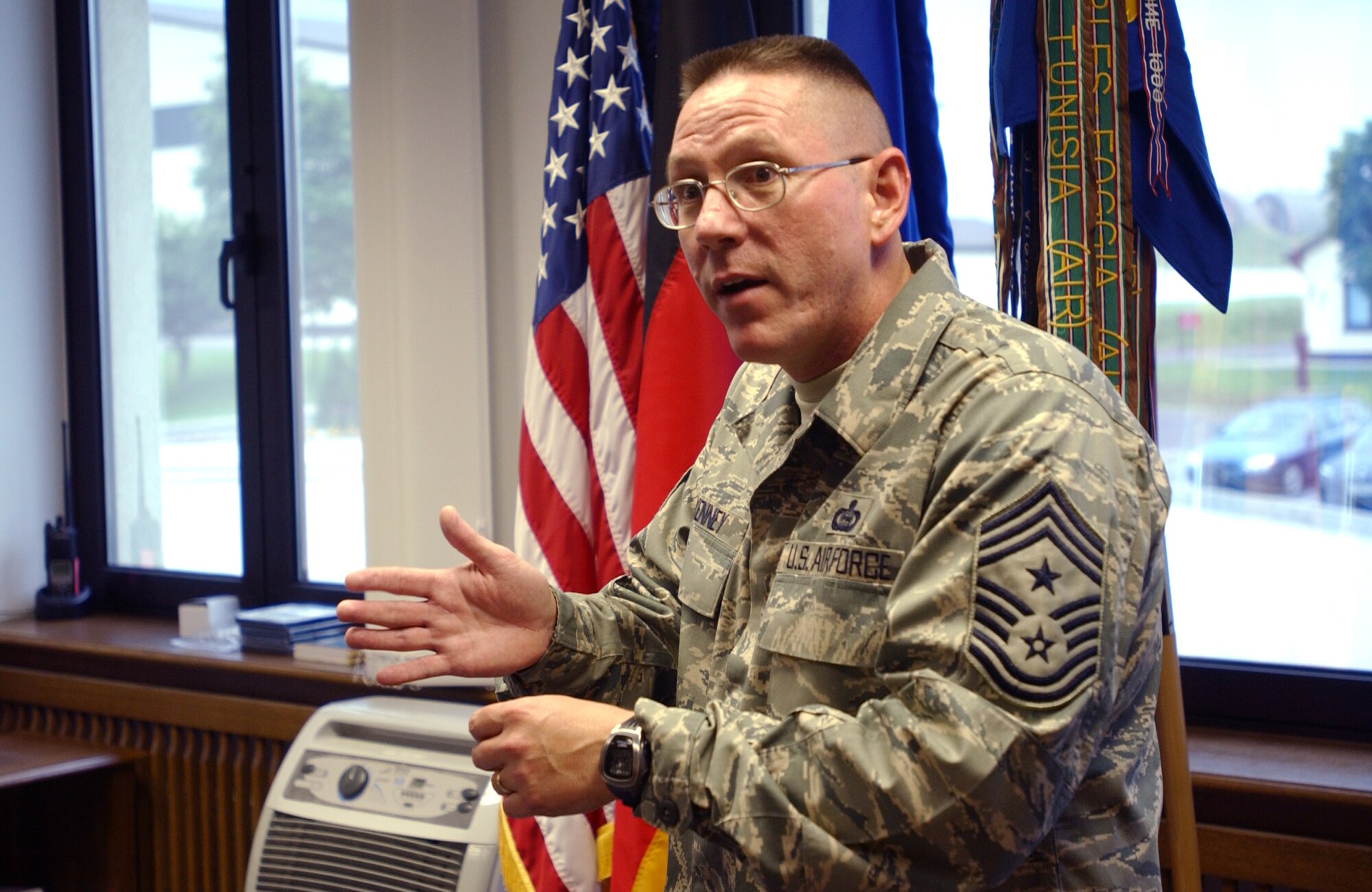 The 52nd Fighter Wing's newest Command Chief, Chief Master Sgt. Bruce A. Kenney, talks about quality of life issues affecting Airman today.  (US Air Force photo by Master Sgt. Alexander R. Ray)                 