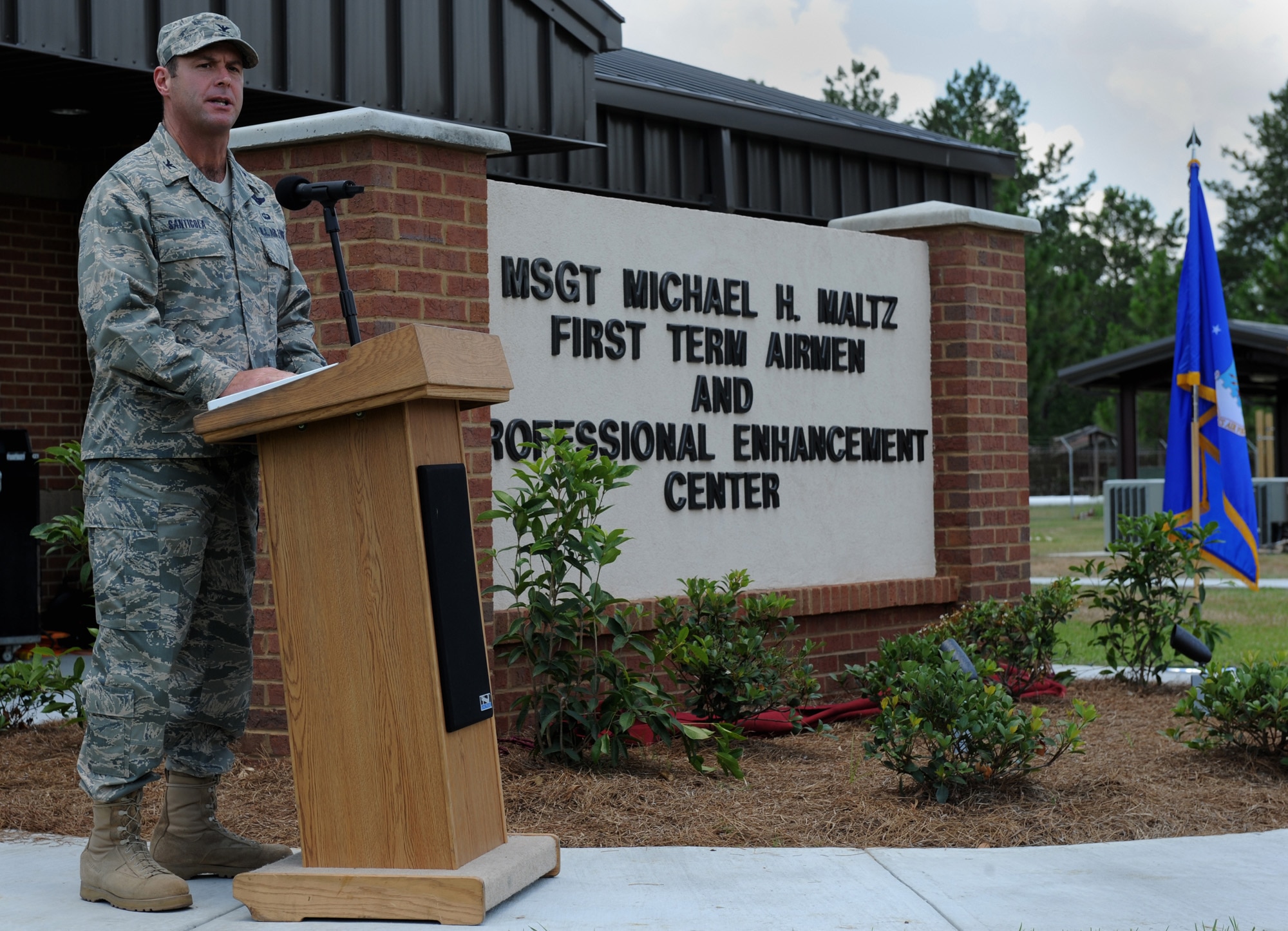 MOODY AIR FORCE BASE, Ga. -- Col. Henry Santicola, 23rd Wing vice commander, gives his closing remarks at a dedication ceremony here June 6. Moody's new First Term Airmen Center was dedicated to fallen pararescueman Master Sgt. Michael H. Maltz, who died in a helicopter accident during a rescue mission in Afghanistan. (U.S. Air Force photo by Senior Airman Gina Chiaverotti)