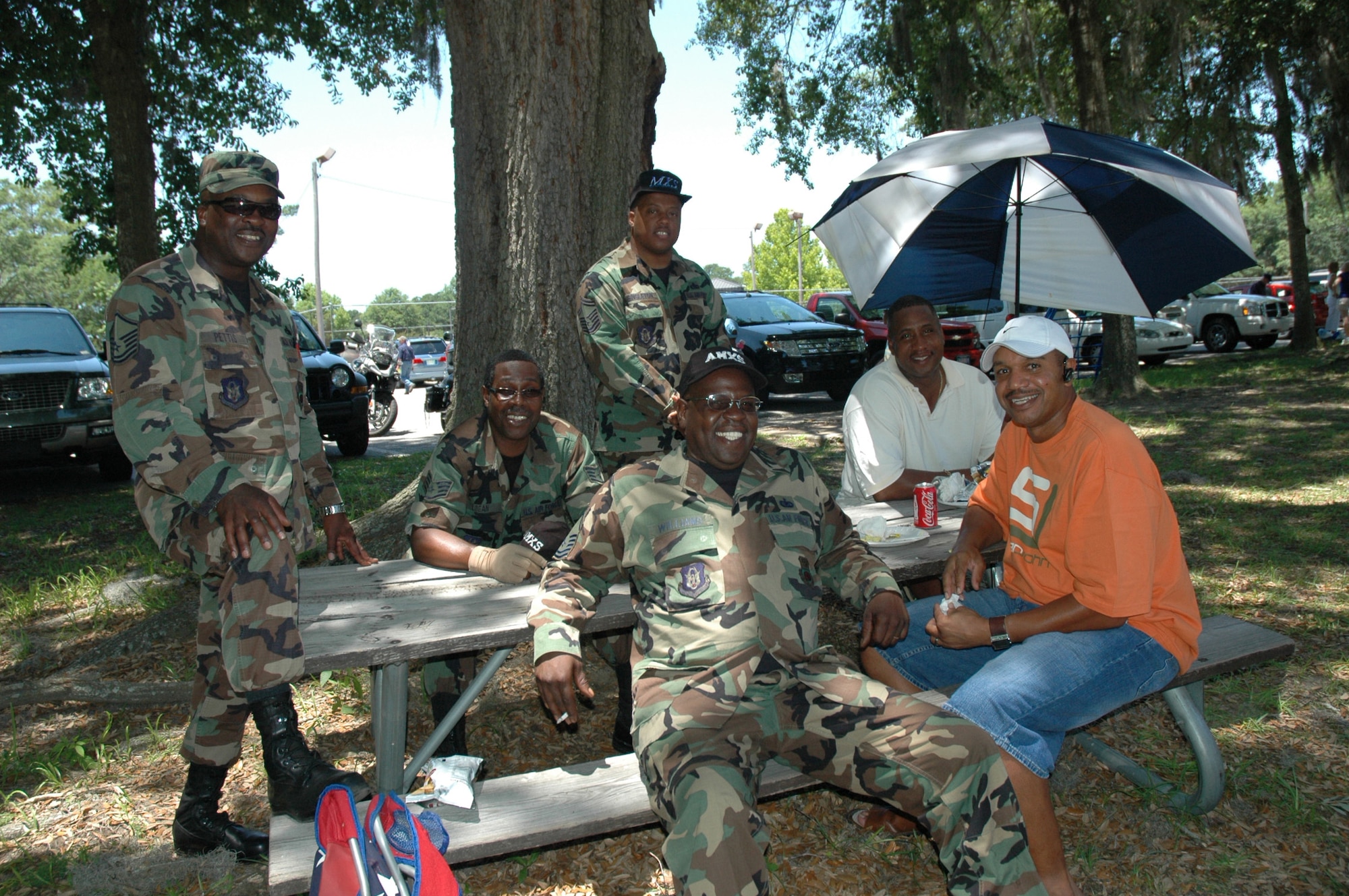 The annual 315th Airlift Wing base picnic was held at Charleston Air Force Base Saturday from 11 a.m. to 4 p.m. The event was a fun time for every member of the 315th reserve family with food for all, a boat load of cold beverages to help hold off the heat, and plenty of activities for the kiddies including: jump castles, a blow-up obstacle course, a twirling fair ride, face painting as well as playground equipment. Home Depot came out to support the troops and set up Do-It-Yourself craft tables where reservists and their children were able to build small projects together. Several reservists even brought out the family pet for the occasion.  (U.S. Air Force Photos by Senior Airman Dani Pacheco)