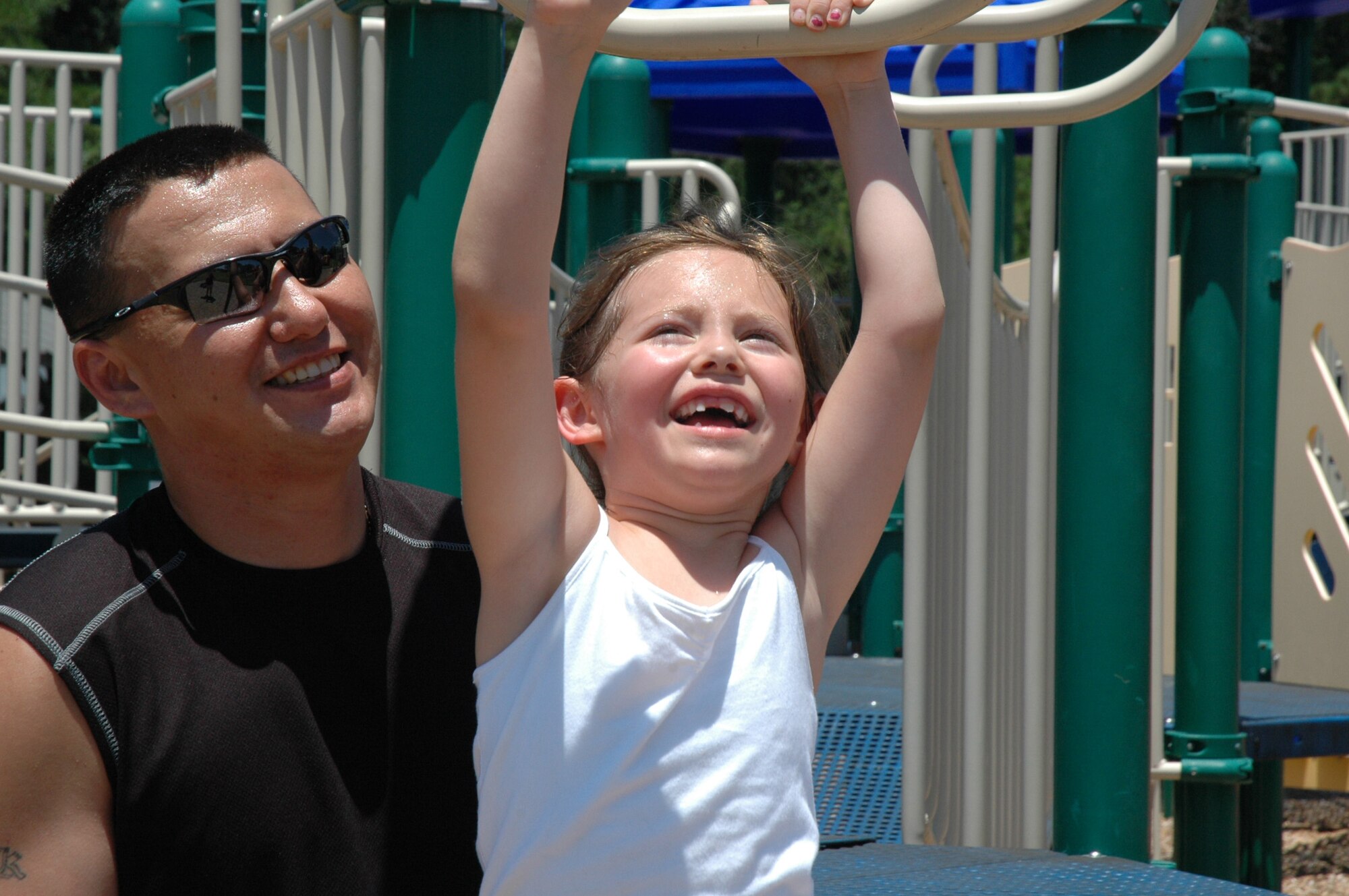 The annual 315th Airlift Wing base picnic was held at Charleston Air Force Base Saturday from 11 a.m. to 4 p.m. The event was a fun time for every member of the 315th reserve family with food for all, a boat load of cold beverages to help hold off the heat, and plenty of activities for the kiddies including: jump castles, a blow-up obstacle course, a twirling fair ride, face painting as well as playground equipment. Home Depot came out to support the troops and set up Do-It-Yourself craft tables where reservists and their children were able to build small projects together. Several reservists even brought out the family pet for the occasion.  (U.S. Air Force Photos by Senior Airman Dani Pacheco)