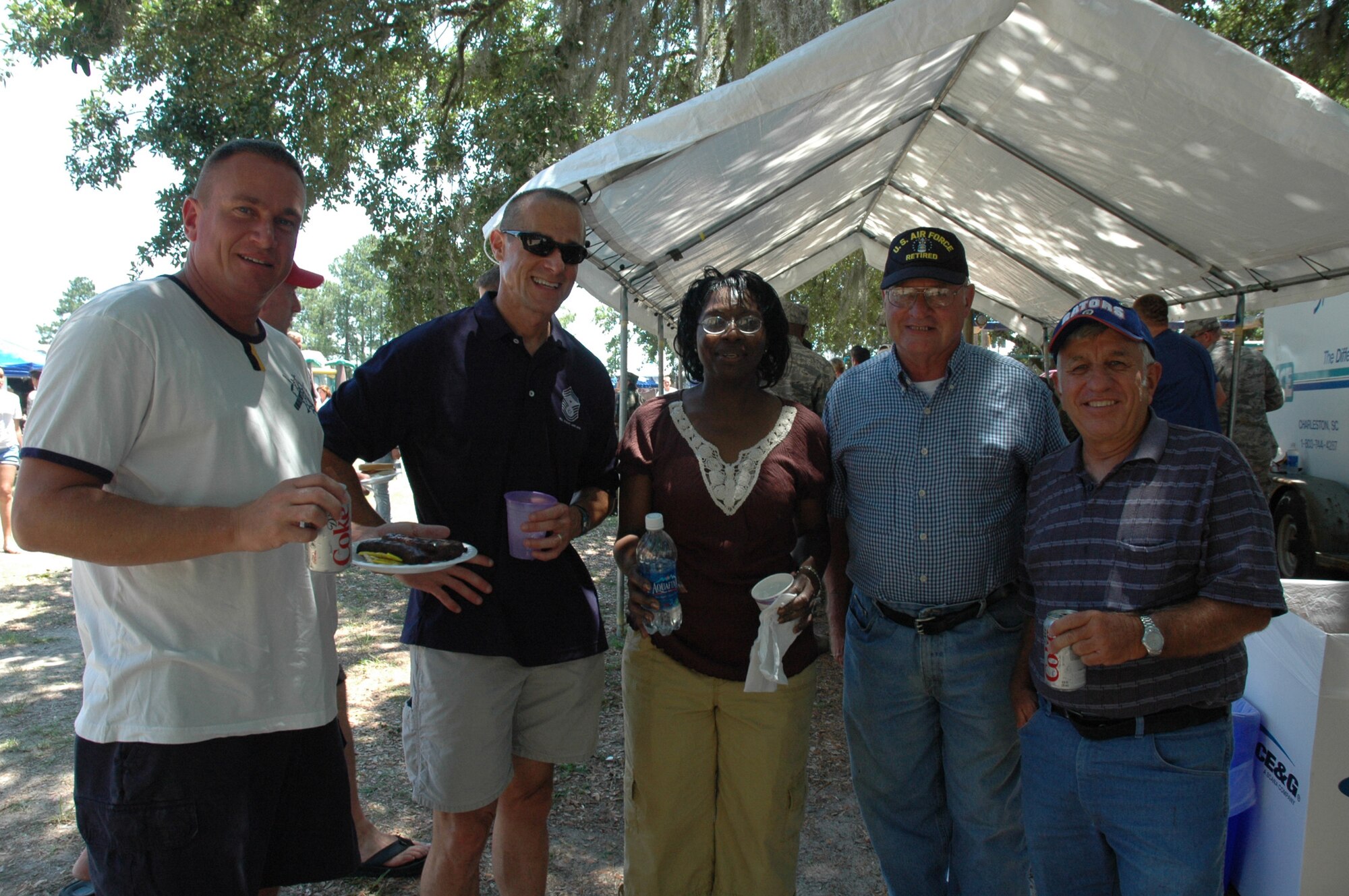 The annual 315th Airlift Wing base picnic was held at Charleston Air Force Base Saturday from 11 a.m. to 4 p.m. The event was a fun time for every member of the 315th reserve family with food for all, a boat load of cold beverages to help hold off the heat, and plenty of activities for the kiddies including: jump castles, a blow-up obstacle course, a twirling fair ride, face painting as well as playground equipment. Home Depot came out to support the troops and set up Do-It-Yourself craft tables where reservists and their children were able to build small projects together. Several reservists even brought out the family pet for the occasion.  (U.S. Air Force Photos by Senior Airman Dani Pacheco)