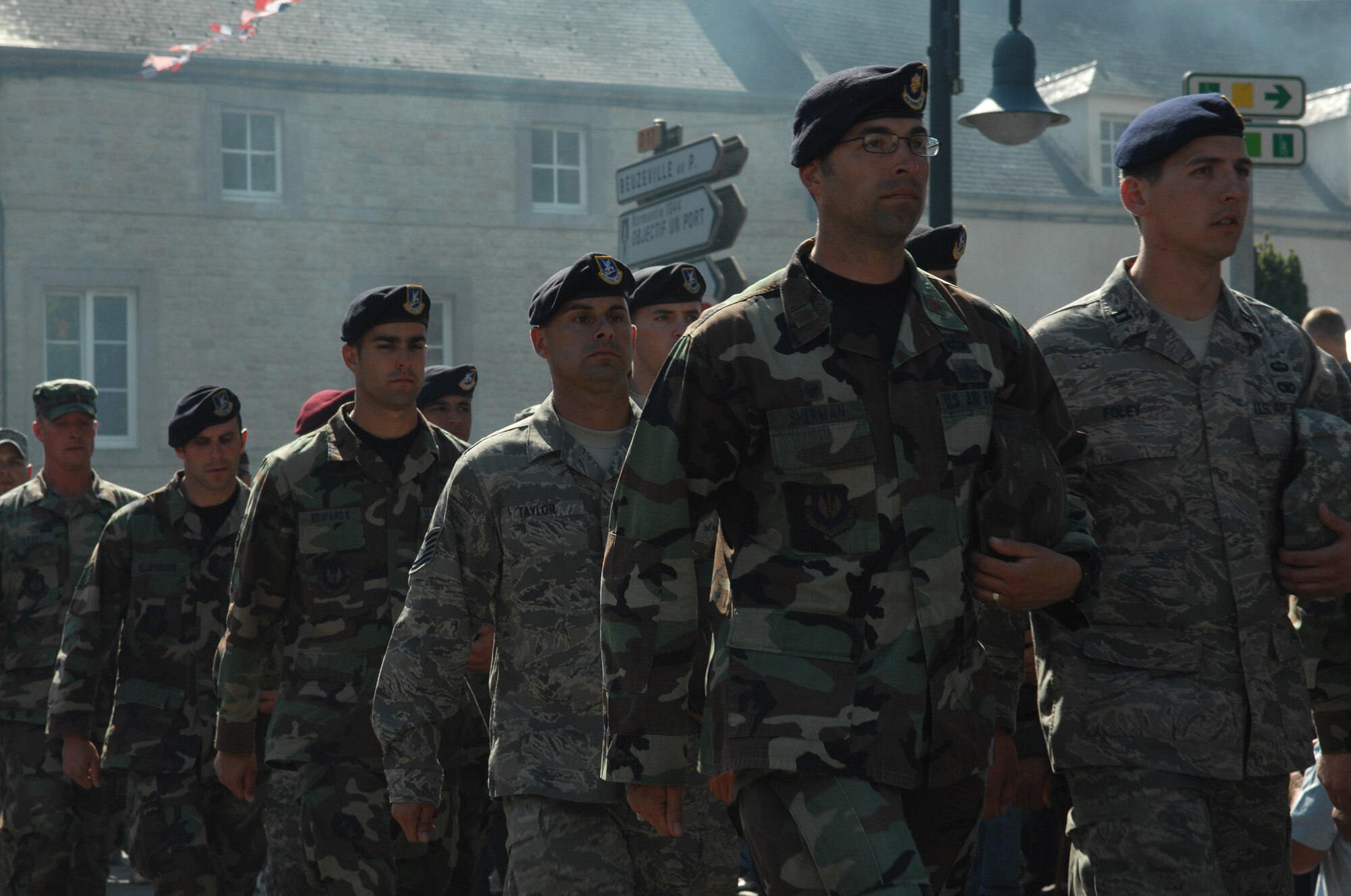 Airmen march through the streets of Sainte-Mere-Eglise, France June 7. The town was the first French village liberated during the Normandy invasion 64 years ago. Photo by Airman 1st Class Amber Bressler*