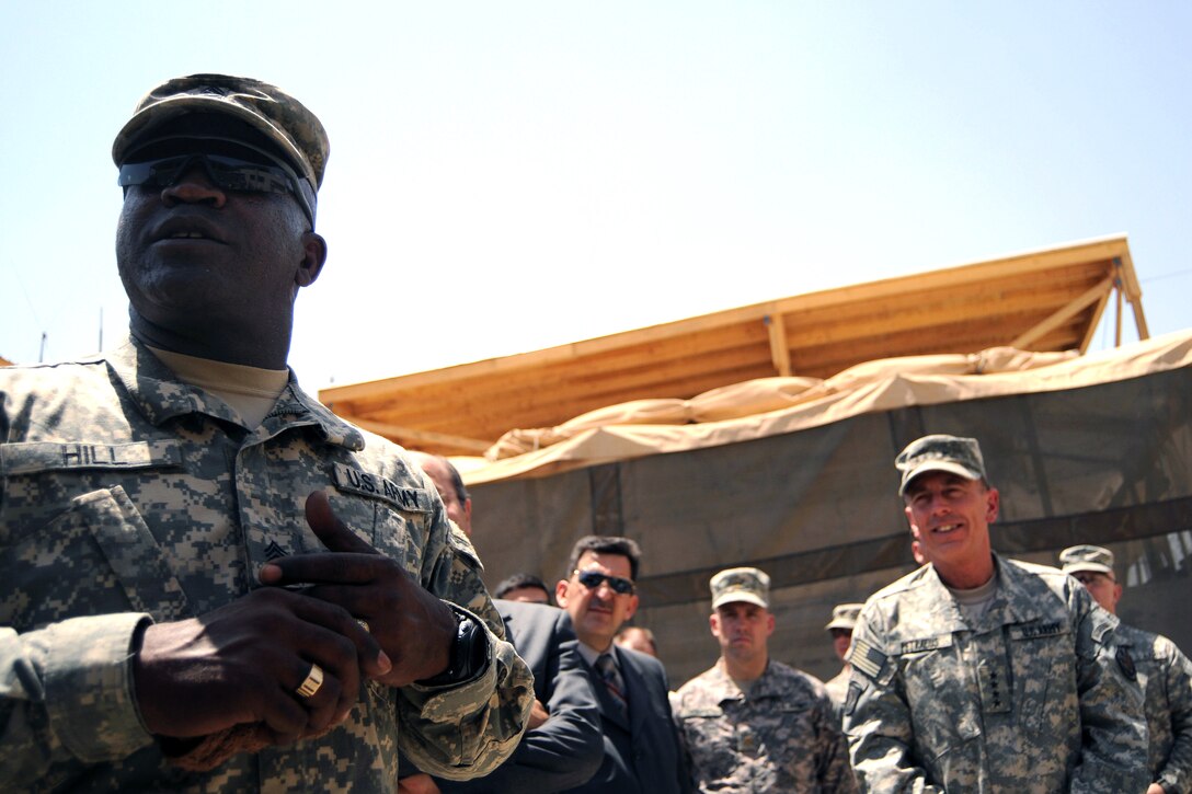 U.S. Army Command Sgt. Maj. Marvin Hill, Multinational Force - Iraq command sergeant major, thanks the U.S. soldiers, sailors, airmen and Marines during his visit to the Joint Security Station in the Sadr City district of Baghdad, Iraq, June 4, 2008. 