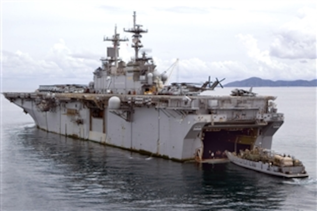 The forward-deployed amphibious assault ship USS Essex performs a stern-gate marriage with Landing Craft Utility 1631, while back-loading elements of the 31st Marine Expeditionary Unit, June 9, 2008. The USS Essex is off the coast of Sattahip, Thailand after completing Cobra Gold 2008, a Thai and U.S.-sponsored military exercise designed to enhance interoperability between joint U.S. forces and the combined forces of the United States, Thailand, Singapore, Japan and Indonesia. 