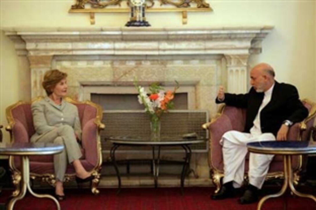 First lady Laura Bush meets with Afghanistan President Hamid Karzai at Gul Khana Palace in Kabul, Afghanistan, June 8, 2008. 