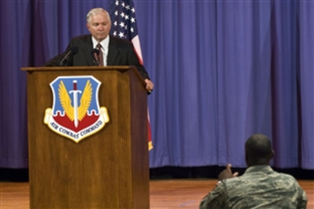 U.S. Defense Secretary Robert M. Gates listens to a question from an Air Combat Command airman on Langley Air Force Base, Va., June 9, 2008. Gates reassured the airmen that they are part of the premier air force in the world, and discussed the recent resignations of top Air Force officials.