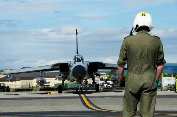 EIELSON AIR FORCE BASE, Alaska --A German crew chief directs the pilot of a Tornado down the taxiway to take off and participate in one of many exercises in Red Flag-Alaska 08-3 June 9. Red Flag-Alaska is a series of Pacific Air Forces commander-directed field training exercises for U.S. forces, providing joint offensive counter-air, interdiction, close air support, and large force employment training in a simulated combat environment. (U.S. Air Force photo by Airman 1st Class Christopher Griffin)