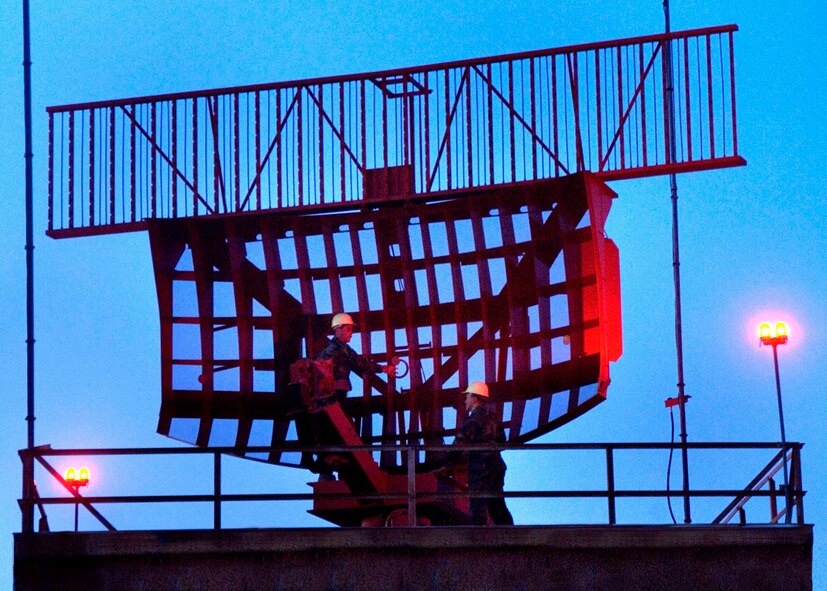 ZULU Time 1219 hr  (5:19am Local Time)(Left to Right) Radar Maintenance Technicians Staff Sergeant Kirk Vanderpool and Technical Sergeant James Lingafeldt, members of the 60th Communications Squadron perform a preventive maintenance check on the air surveillance radar equipment at Travis Air Force Base, California.  The maintenance is completed in the early morning hours to minimize the impact on flight operations.    USAF photo by Civ/ Nan Wylie