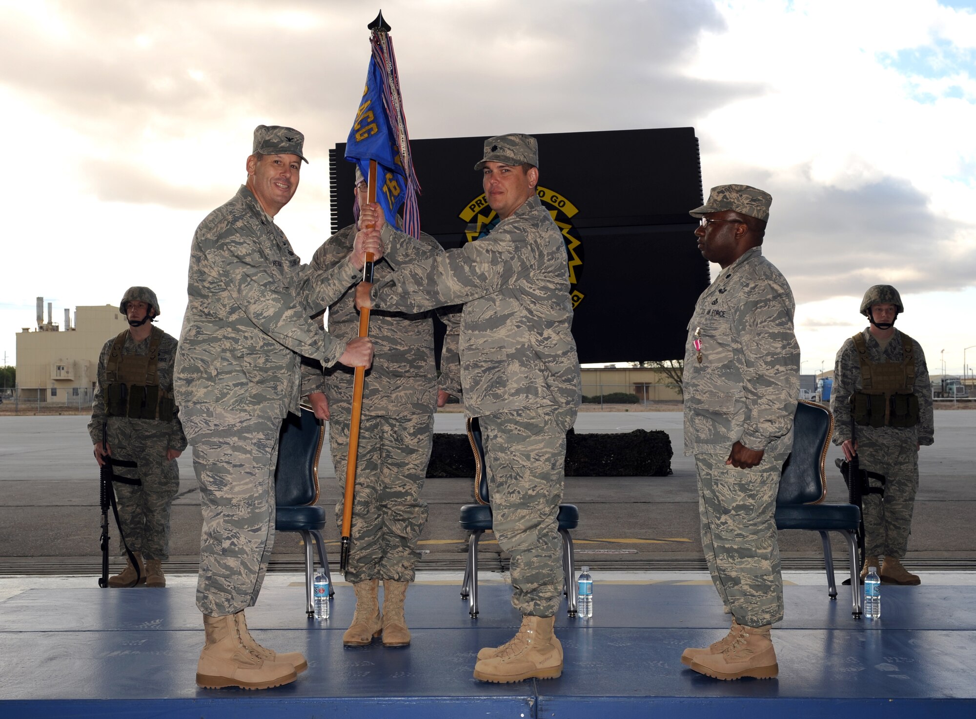 MOUNTAIN HOME AIR FORCE BASE, Idaho - Lt. Col. Bryan Gates assumes command of the 726th Air Control Squadron from Col. John Pericas, 522nd Air Control Group, in a change-of-command ceremony June 6 at Hangar 1333. (U.S. Air Force photo/ Airman 1st Class Ryan Crane)