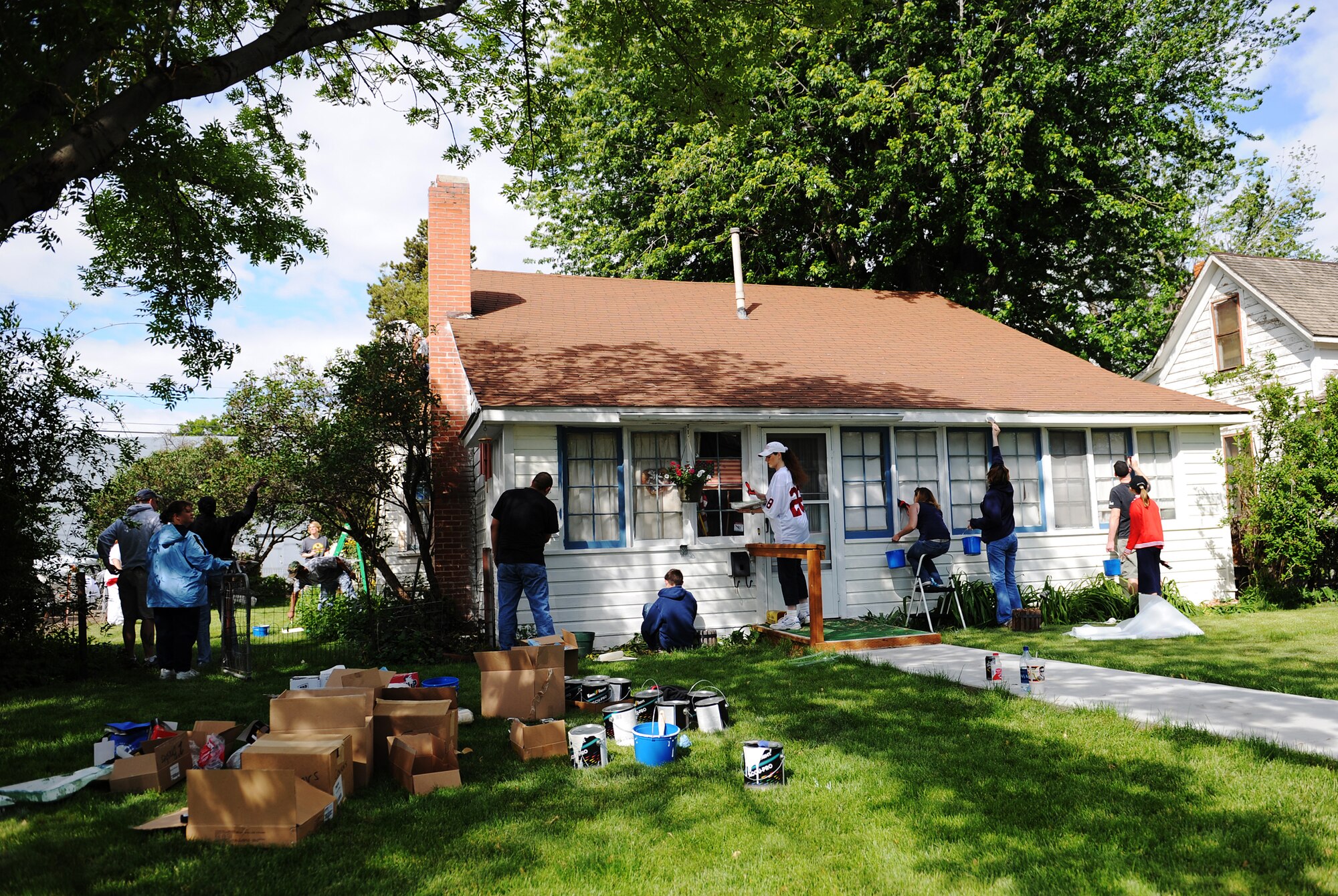MOUNTAIN HOME AIR FORCE BASE, Idaho - More than 2,000 volunteers from the base and the local community gathered to help clean and re-paint houses in Boise and the Treasure Valley as part of “Paint the Town” June 7. Paint the Town has helped restore old houses in the community for the last 26 years. (U.S. Air Force photo/ Airman 1st Class Ryan Crane)