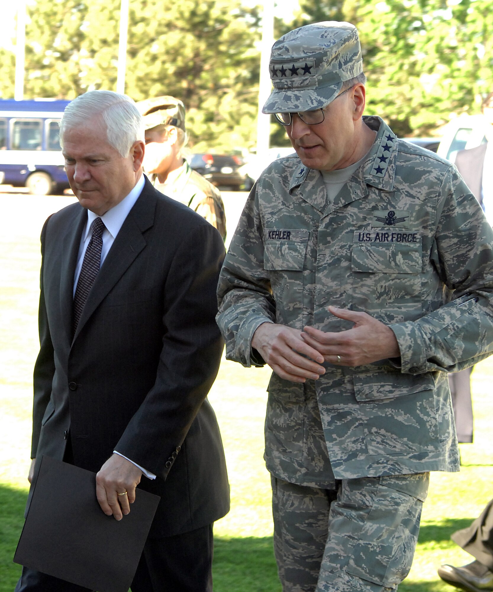 Secretary of Defense Robert M. Gates and Gen. C. Robert "Bob" Kehler arrive at the base auditorium June 10 at Peterson Air Force Base, Colo. The Defense secretary spoke to senior Air Force Space Command leaders. General Kehler is the commander of Air Force Space Command. (U.S. Air Force photo/Tech. Sgt. Matt Lohr) 
