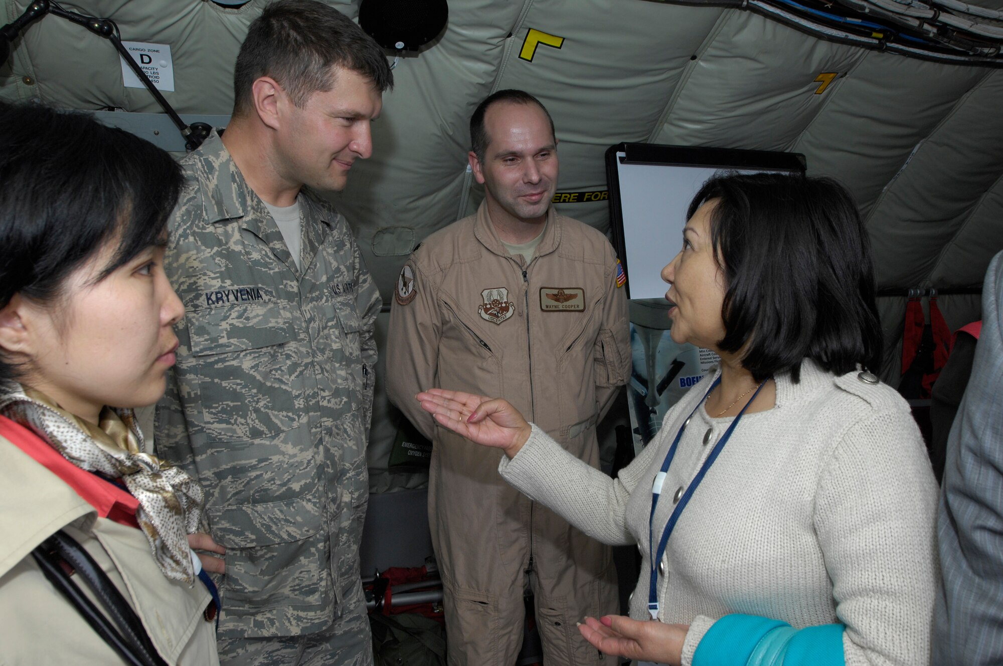 Staff Sgt. Alexander Kryvenia, shift manager for 96th medical group, gives KC-135 tour for Kyrgyz parliament members during his deployment to Iraq.  Photo provided by Manas Air Base Public Affairs. 