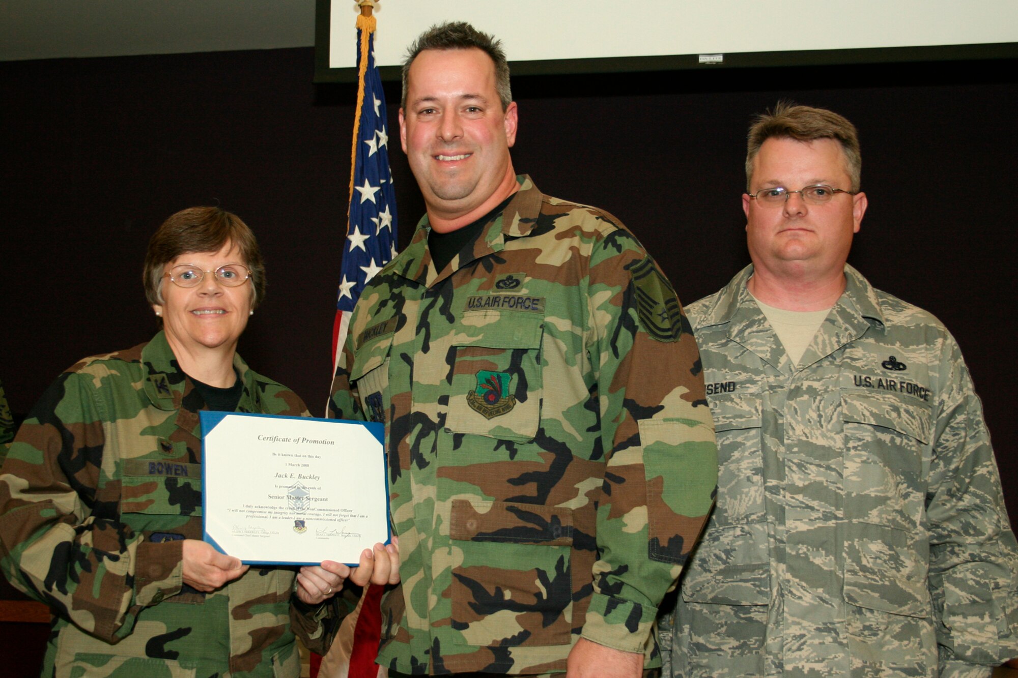 GRISSOM AIR RESERVE BASE, Ind., -- Jack Buckley, a heating, ventilation and air conditioning technician with the 434th Civil Engineers Squadron, is promoted to senior master sergeant. Presenting the certificate is Col. Betty Bowen, 434th Mission Support Group commander, and Chief Master Sgt. Chad Weisend, 434th Maintenance Group superintendent. (U.S. Air Force photo/Tech. Sgt. Patrick Kuminecz)