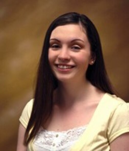 MINOT AIR FORCE BASE, N.D. -- Siobhan Goldin, wife of Airman 1st Class Casey Goldin, 5th Munitions Squadron missile maintainer here, won a $5,000 award recently from SRT Communications. She submitted a story as part of an regional competition about how communication services and products affect everyday life. (Courtesy Photo)