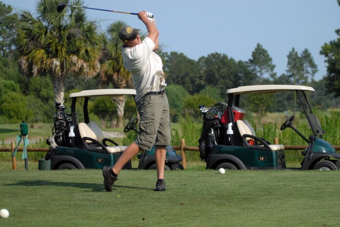 Brent Hillard follows the flight of his drive at the second tee of Wrenwoods Golf Course June 9. (U.S. Air Force photo/Senior Airman Sam Hymas)