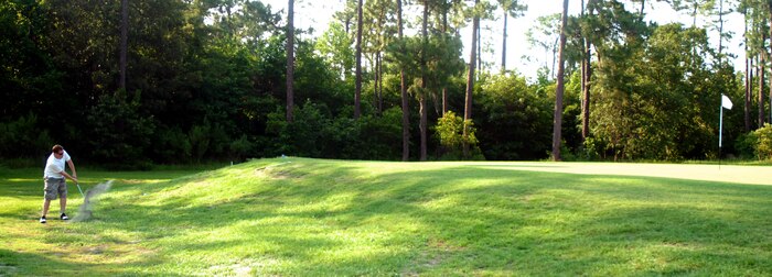 Justin Kern chips onto the green at the second hole at Wrenwoods Golf Course June 9. (U.S. Air Force photo/Senior Airman Sam Hymas)