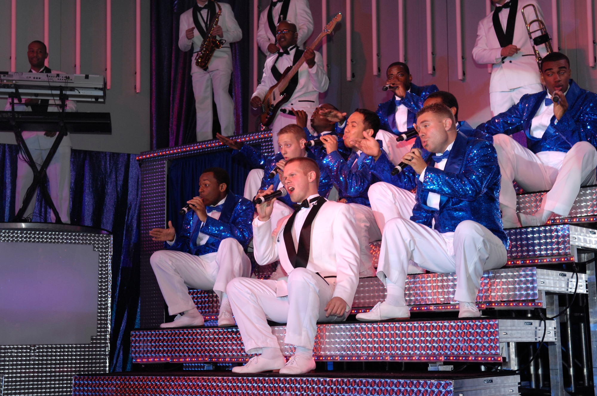 VANDENBERG AIR FORCE BASE, Calif.  -- Tops in Blue members perform movie themes during a free performance at Cabrillo High School in Lompoc June 7. The Airmen entertainers perform nearly 150 shows in 30 countries. (U.S. Air Force photo by Airman 1st Class Ashley Reed)
