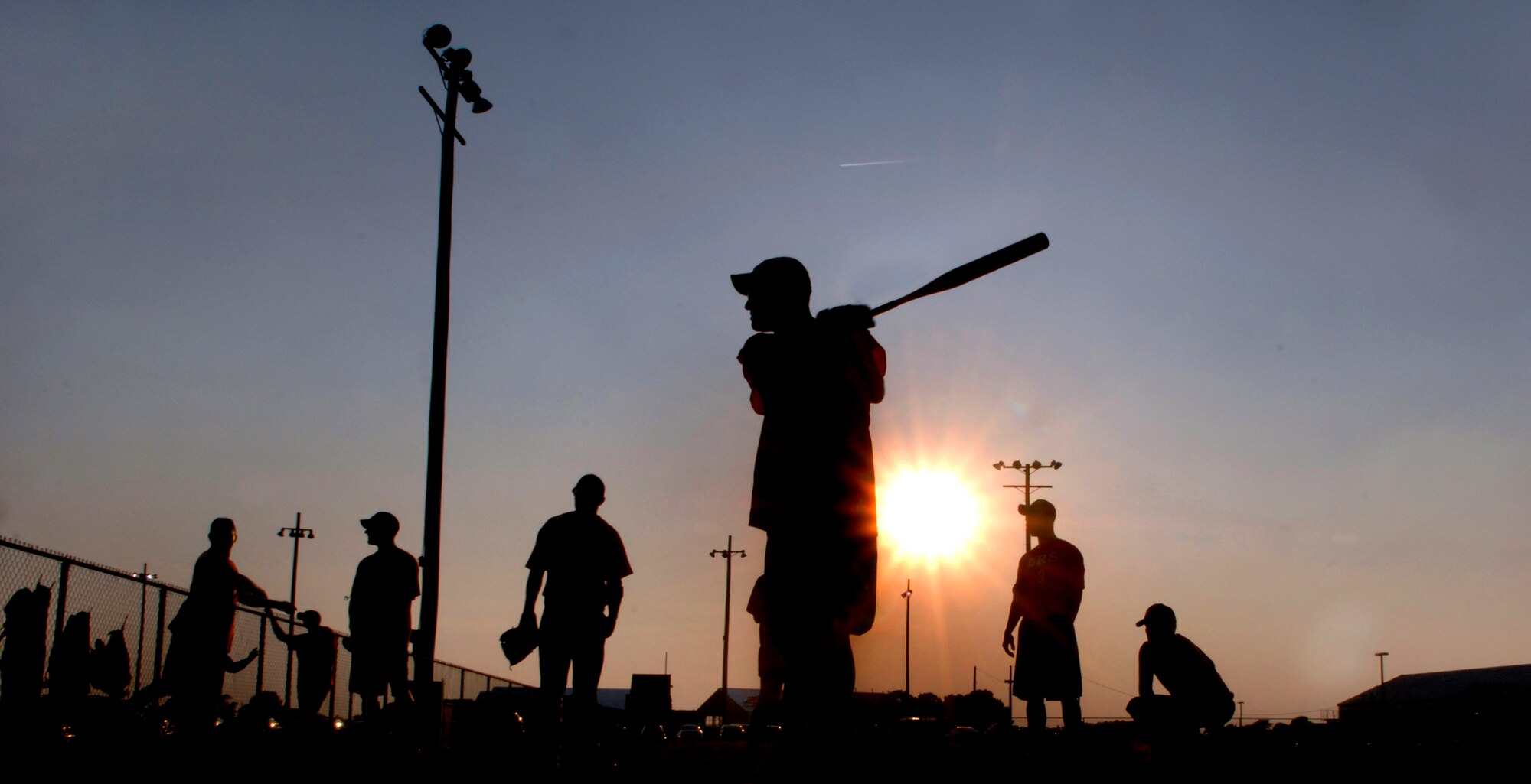 LANGLEY AIR FORCE BASE, Va. -- Tech. Sgt. Danny Bowlin, 1st Logistics Readiness Squadron softball coach,  swings the bat before a national league game against the 1st Civil Engineer Squadron June 9.  Despite the efforts of the 1st LRS,  the 1st CES won 18-14.  (U.S. Air Force photo/Senior Airman Vernon Young)