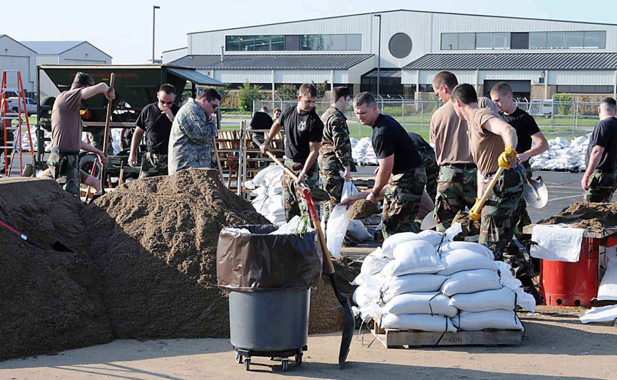 Indiana Air National Guard members continuously fill sandbags in relief following the flood waters that hit Vigo County June 7. The guardsmen are assigned to the 181st Intelligence Wing from Terre Haute, Ind. (U.S. Army photo/Staff Sgt. Chris Jennings)