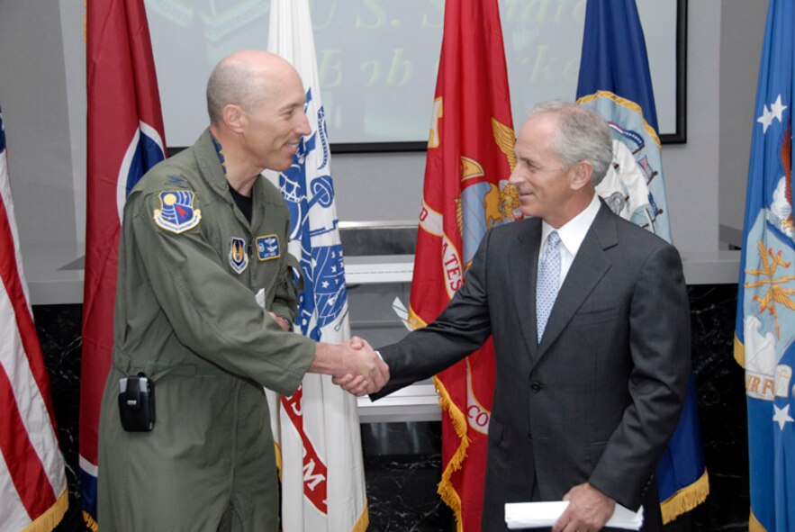 Arnold Engineering Development Center (AEDC) Commander Col. Art Huber welcomes U.S. Sen. Bob Corker to AEDC before a press conference in the Headquarters building. Senator Corker toured several AEDC facilities during his visit Monday. (Photo by Rick Good friend)